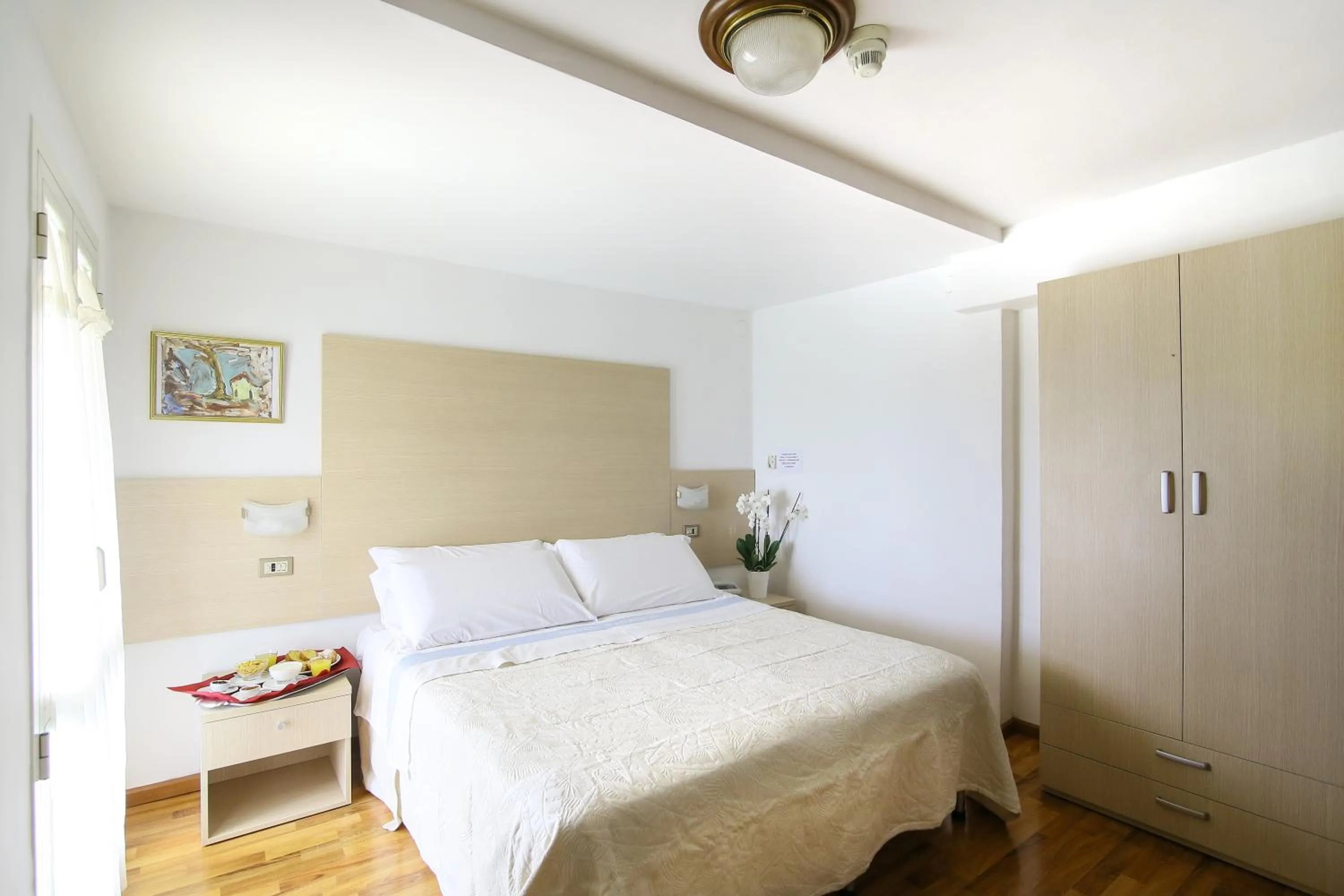 Bed in Hotel Paradiso