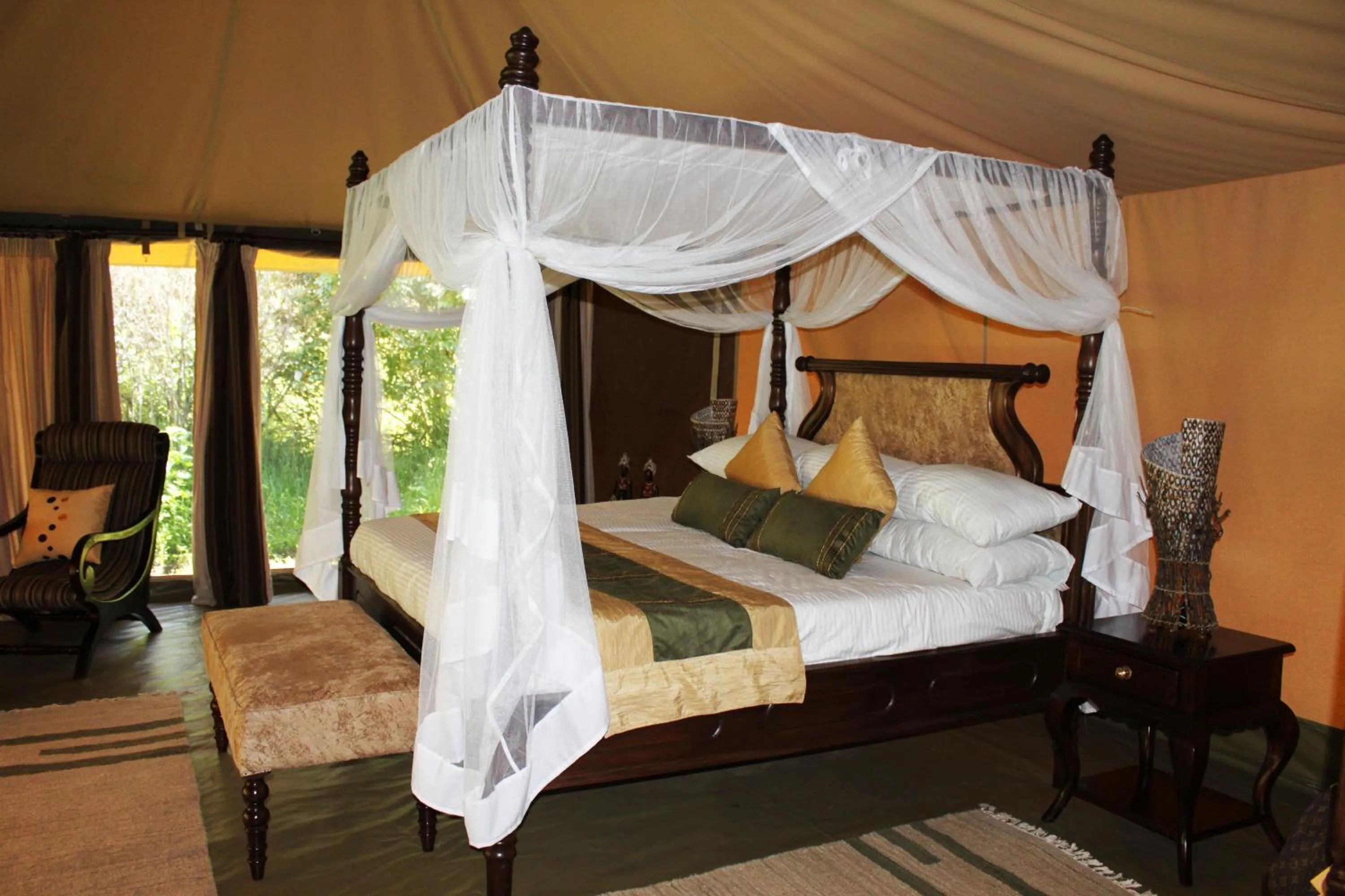 Bed in Mara Ngenche Safari Camp - Maasai Mara National Reserve