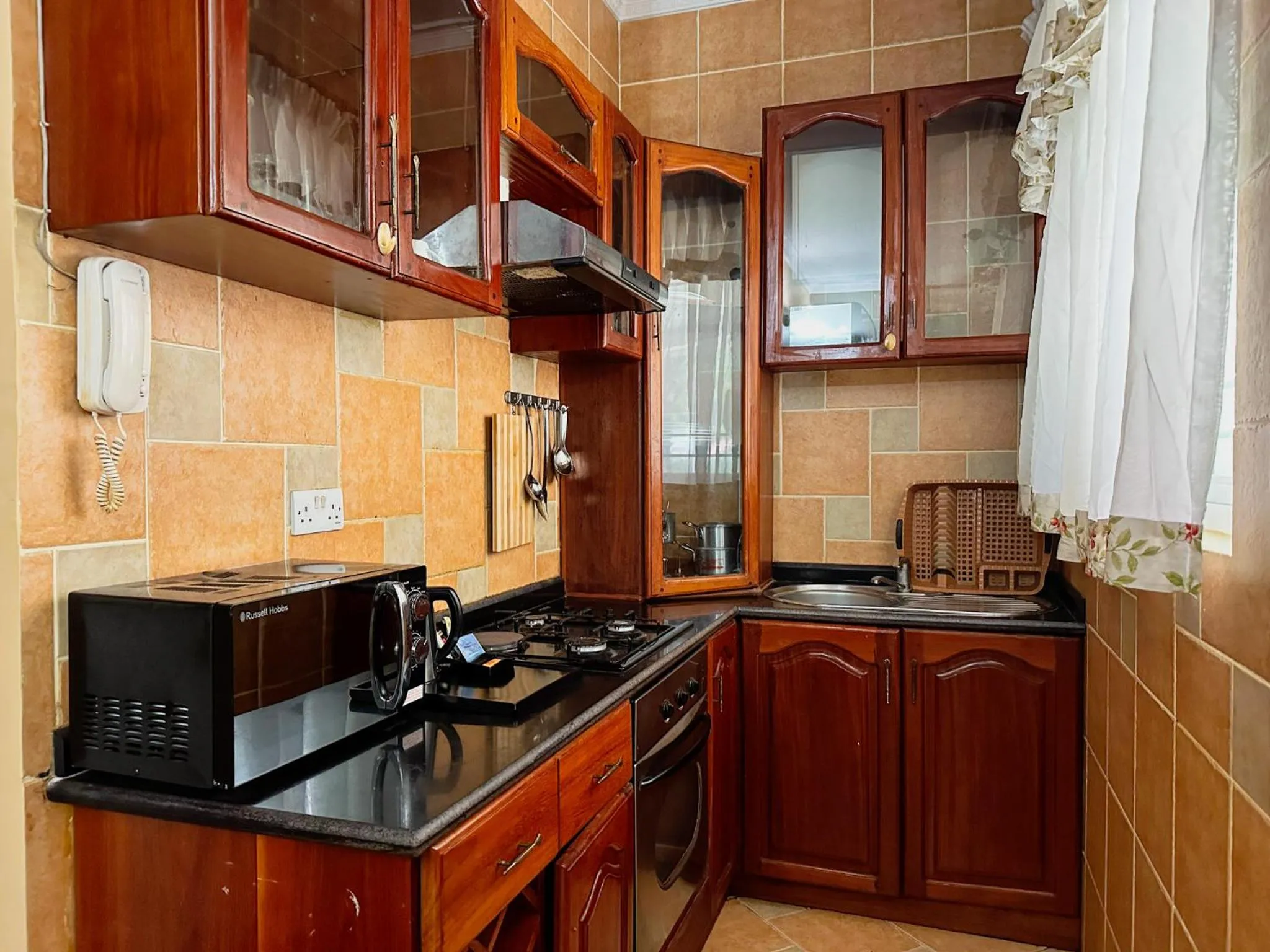 Kitchen or kitchenette in The Amariah Hotel & Apartments Mikocheni
