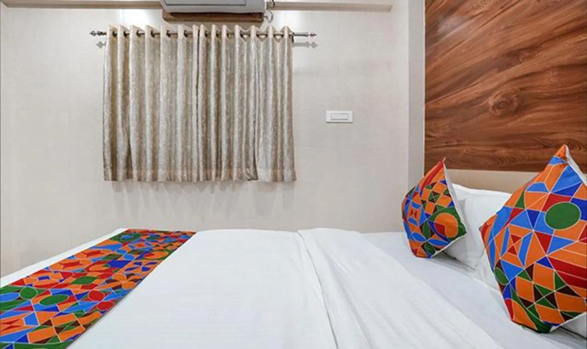 Bed in FabHotel White Gold