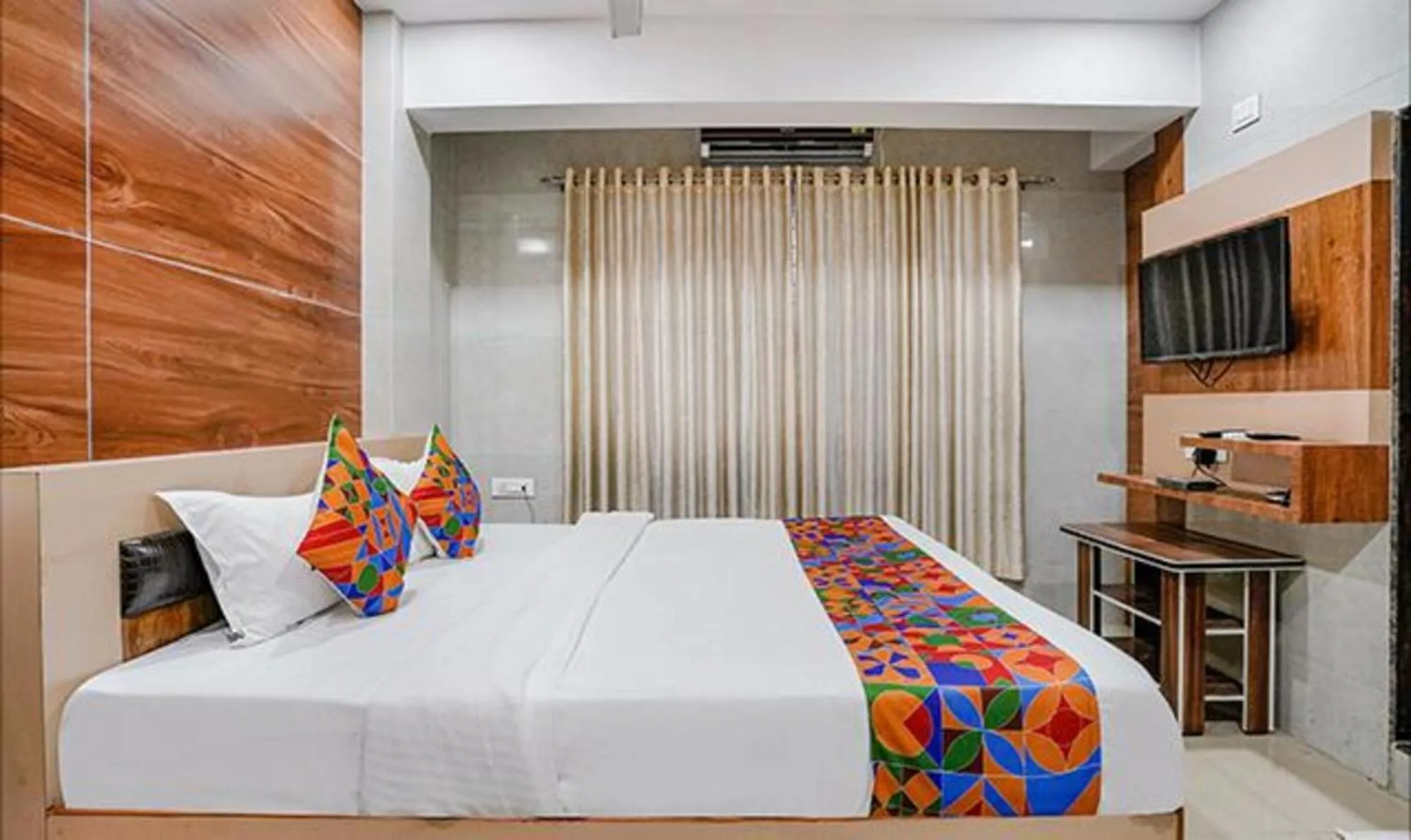 Bed in FabHotel White Gold