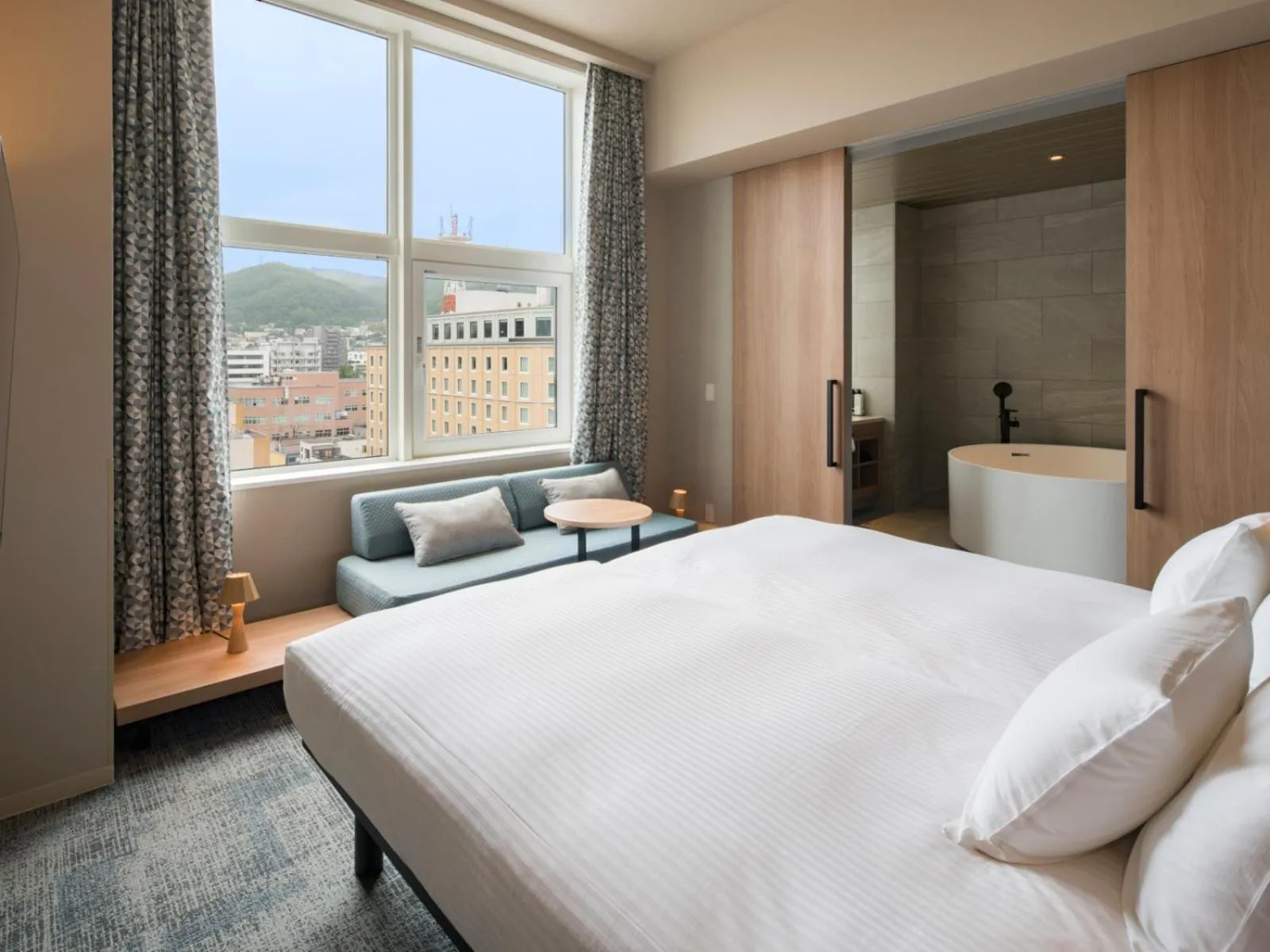 Photo of the whole room, Bed in GRIDS PREMIUM HOTEL OTARU