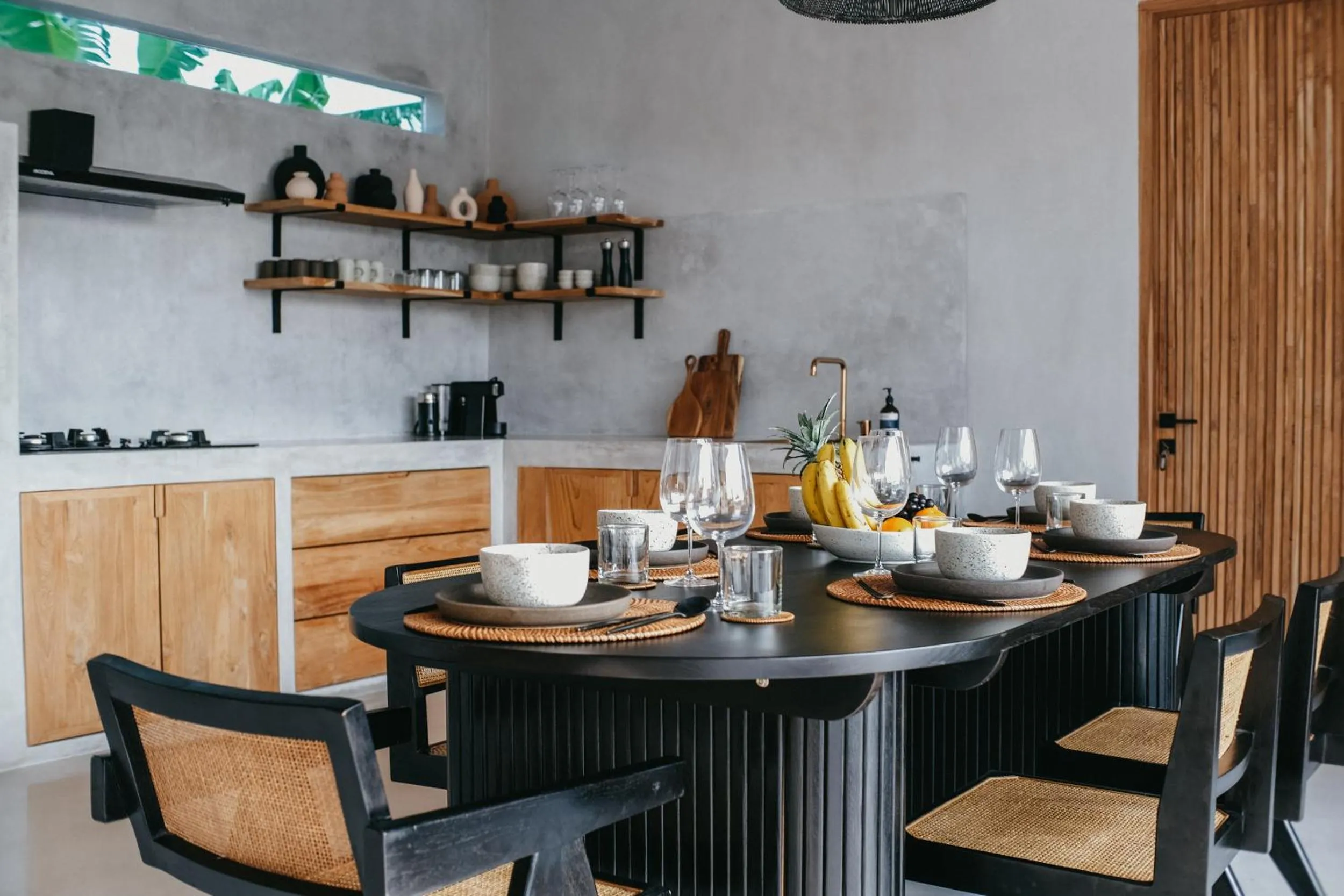 Dining area in Concrete Retreat Villa