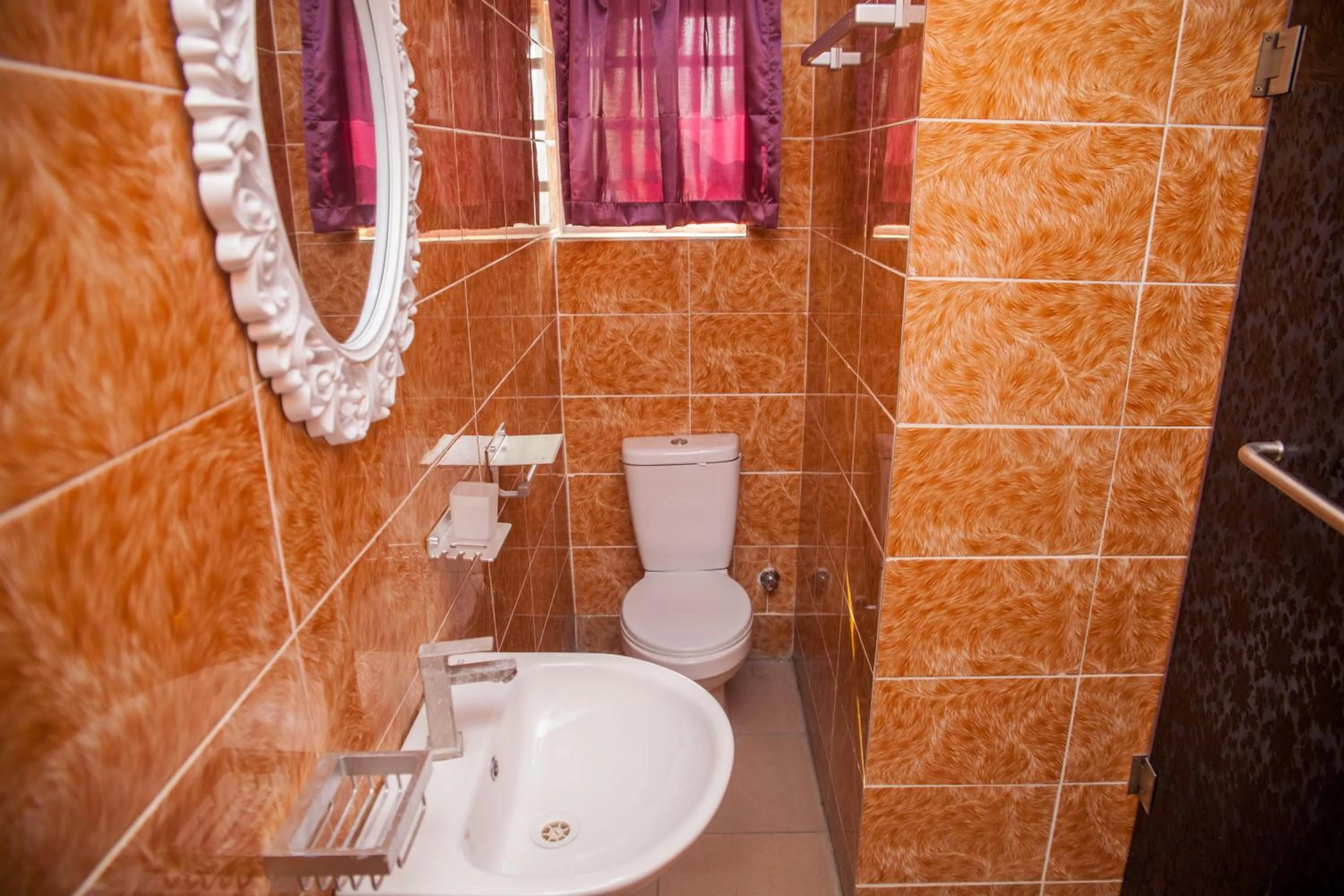 Toilet in Emmy Hotels & Suites