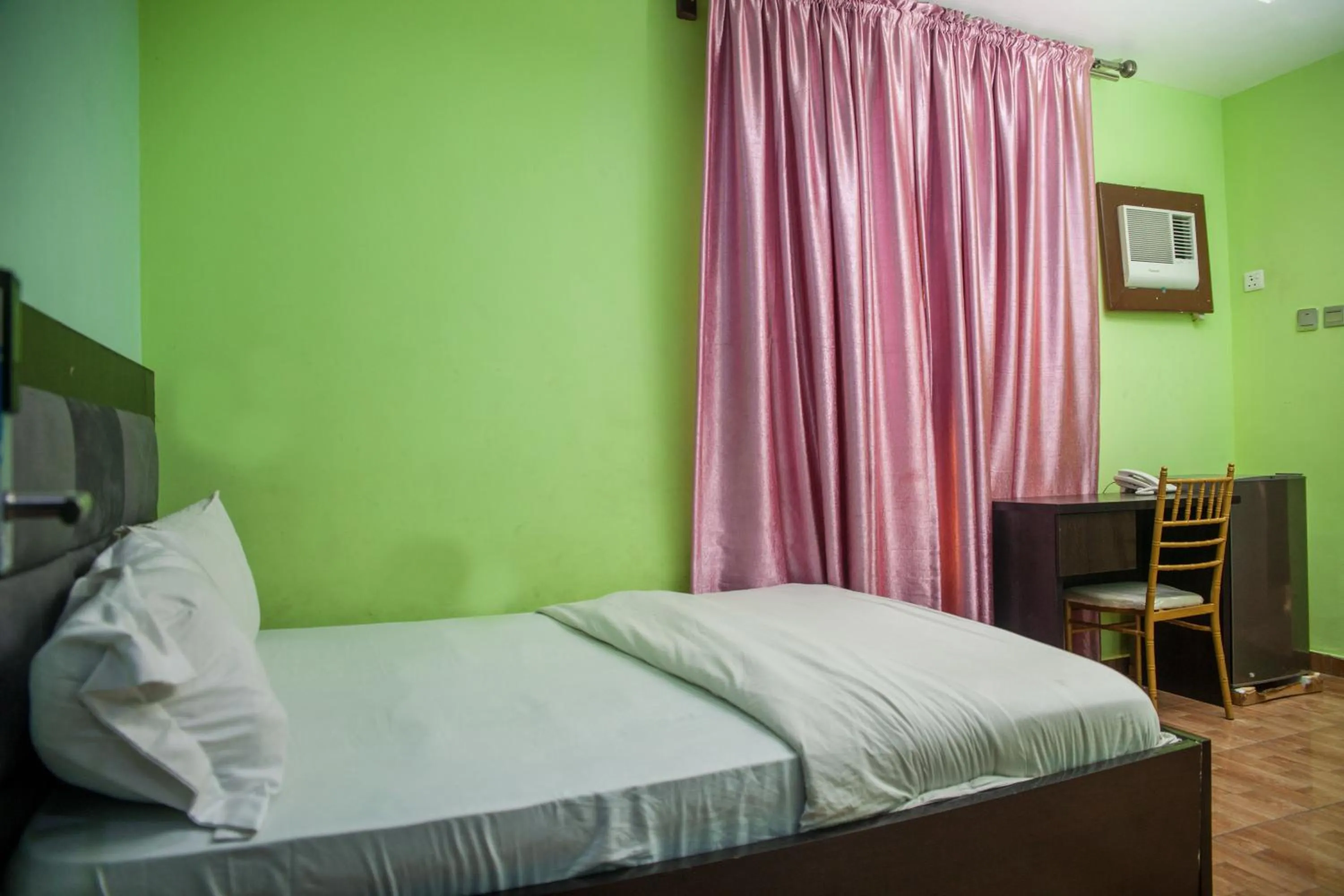 Bed in Emmy Hotels & Suites