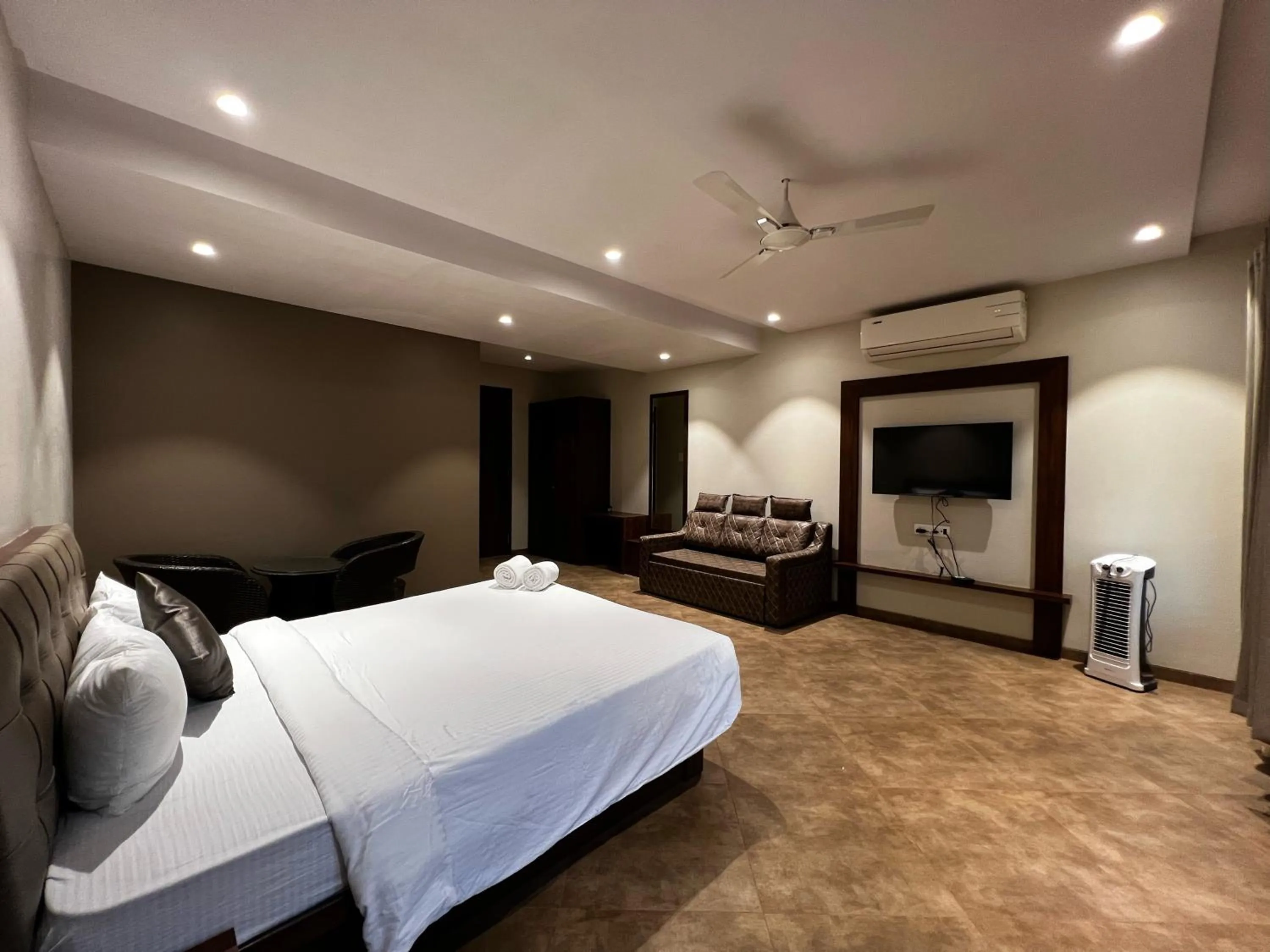 Bed in Paramount Riverfront Resort & Spa, Karjat