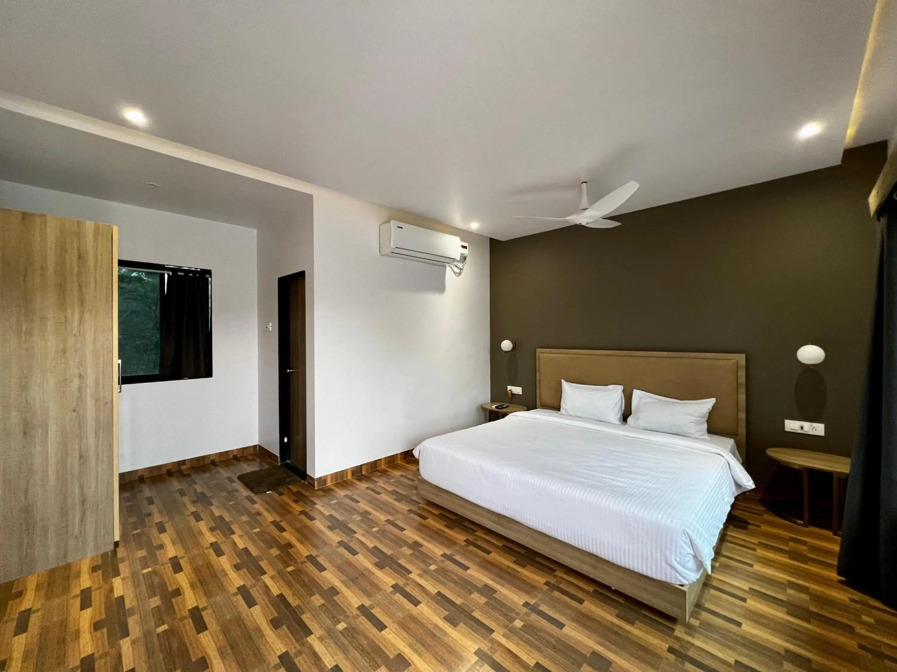 Bed in Paramount Riverfront Resort & Spa, Karjat
