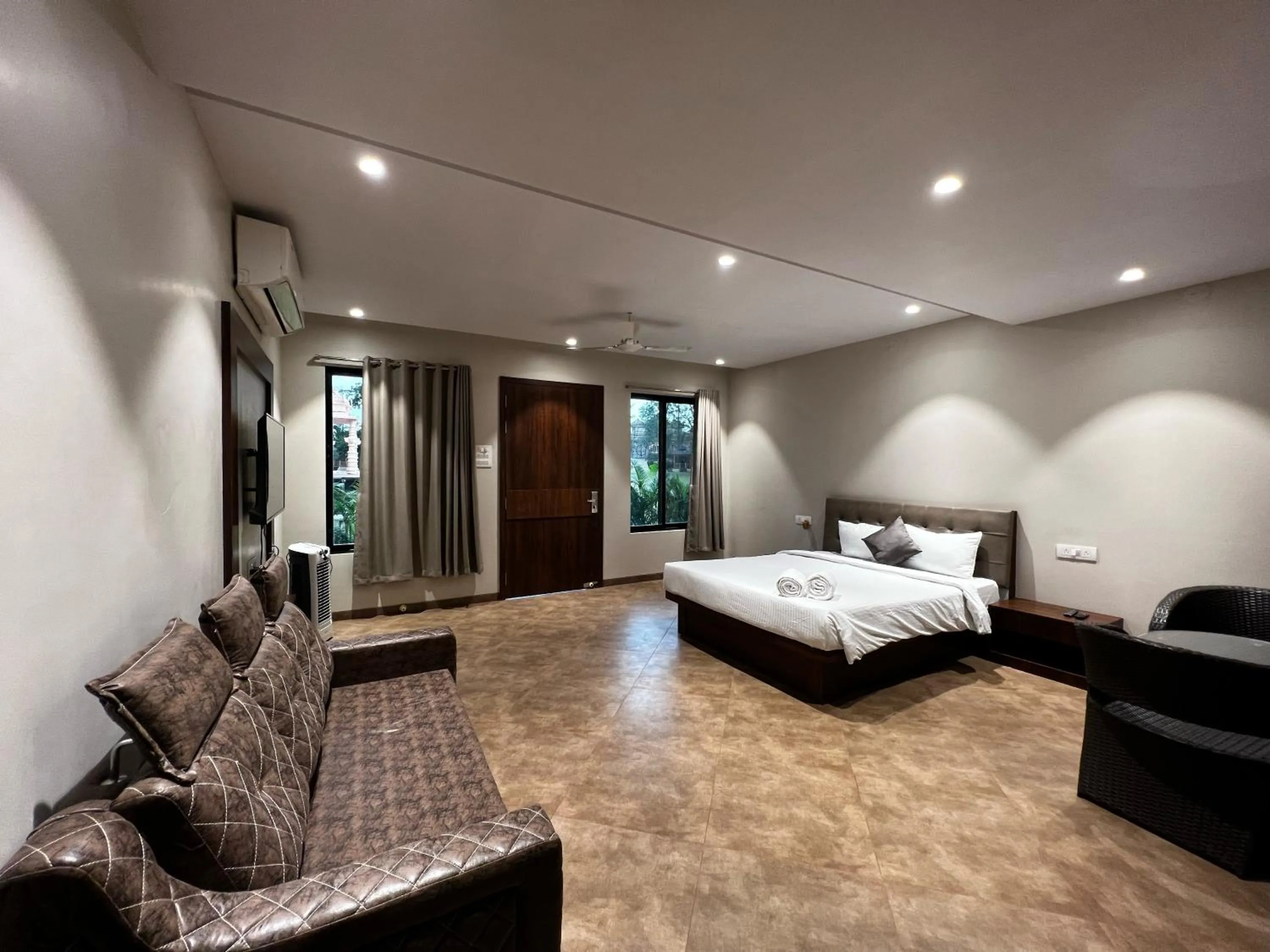 Bed in Paramount Riverfront Resort & Spa, Karjat