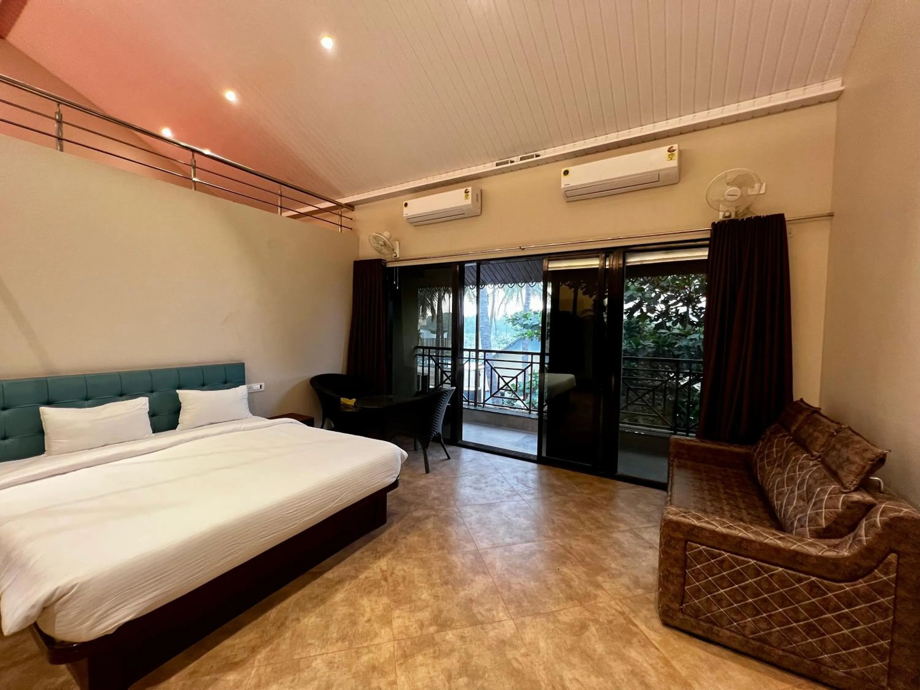 Bed in Paramount Riverfront Resort & Spa, Karjat