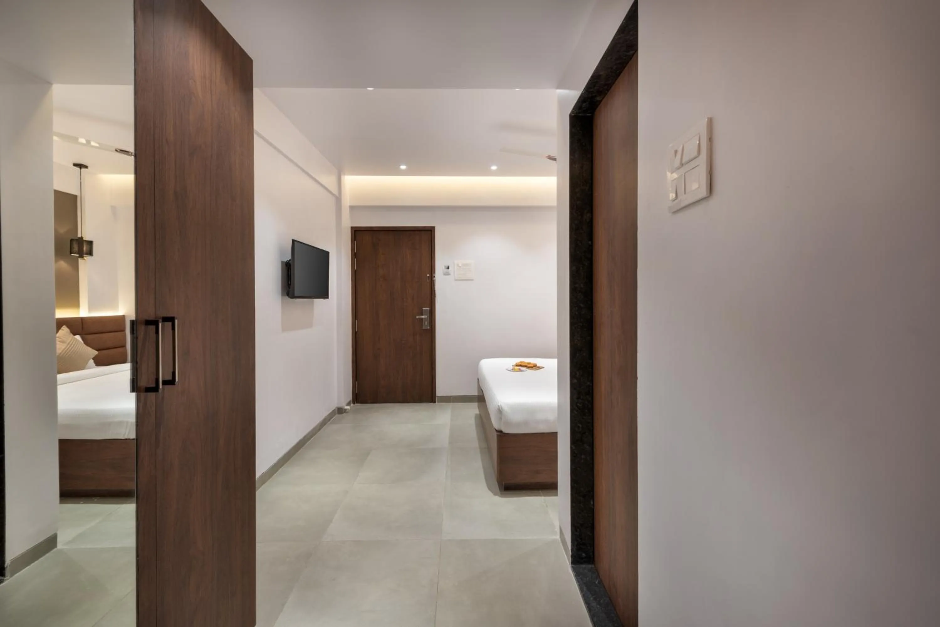 Bed in Paramount Riverfront Resort & Spa, Karjat