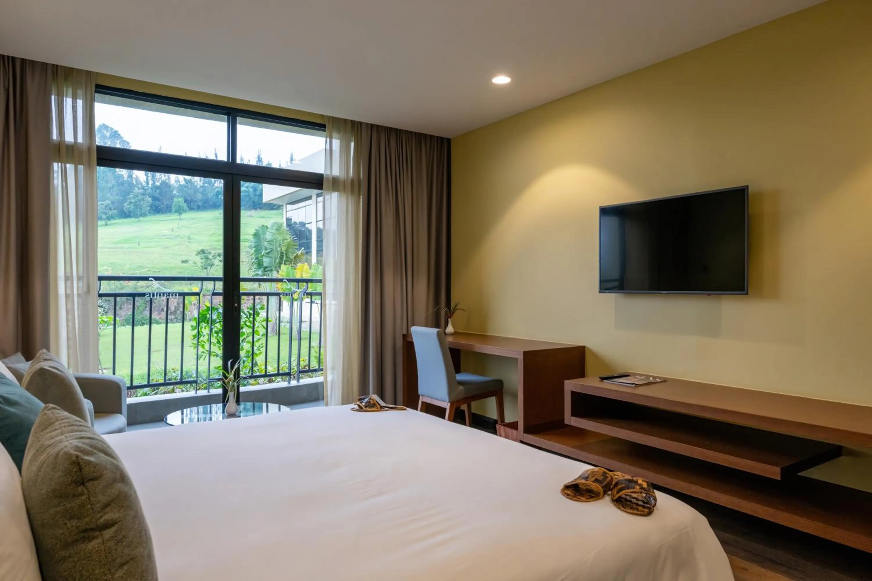 Bed in Mantis Kivu Marina Bay Hotel