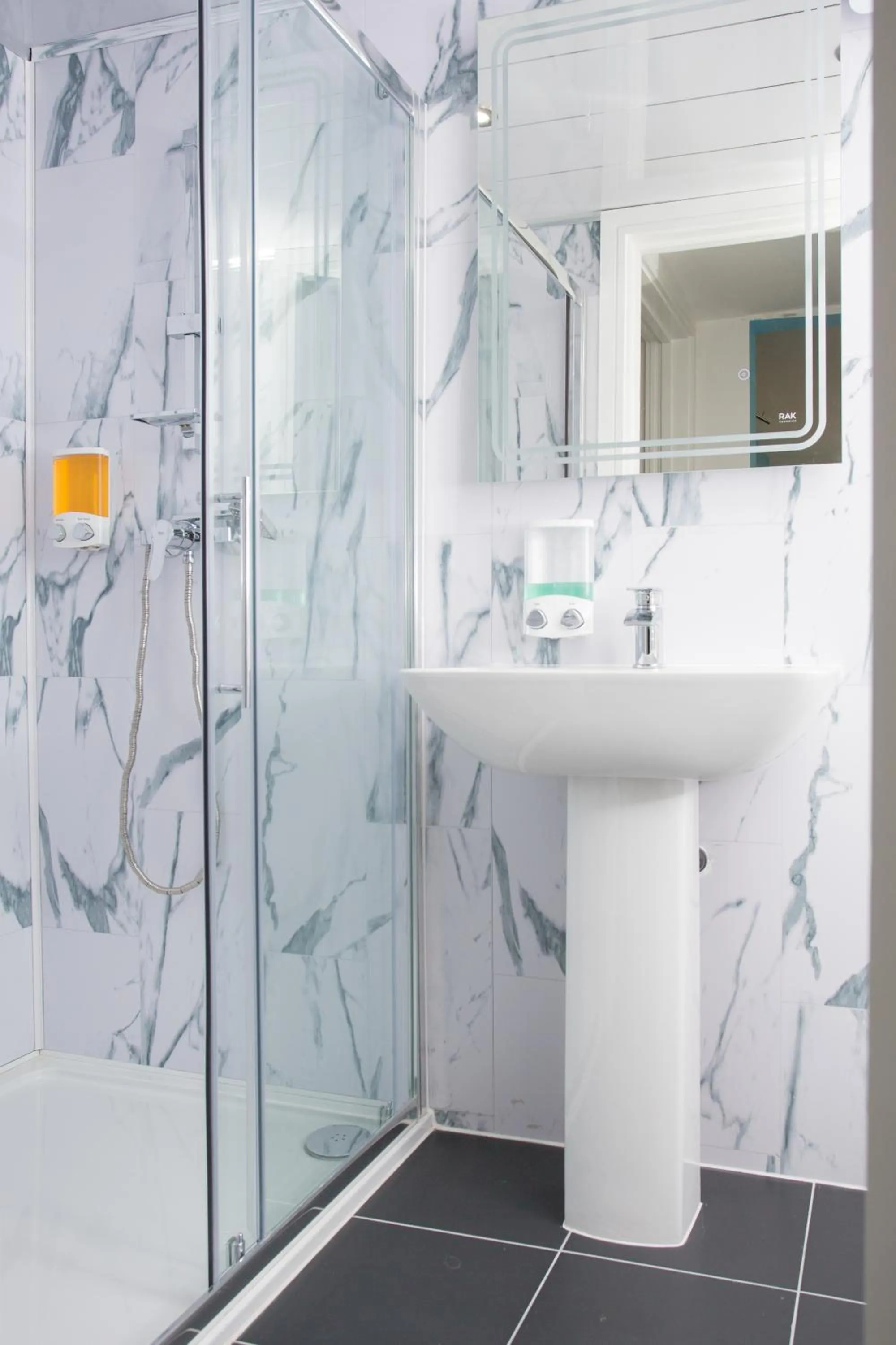 Shower in Legoland Heathrow Windsor Apartment Hotel