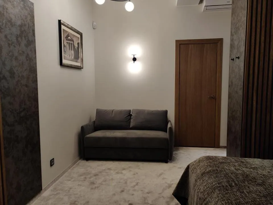 Seating area, Bed in Vvinn Hotel