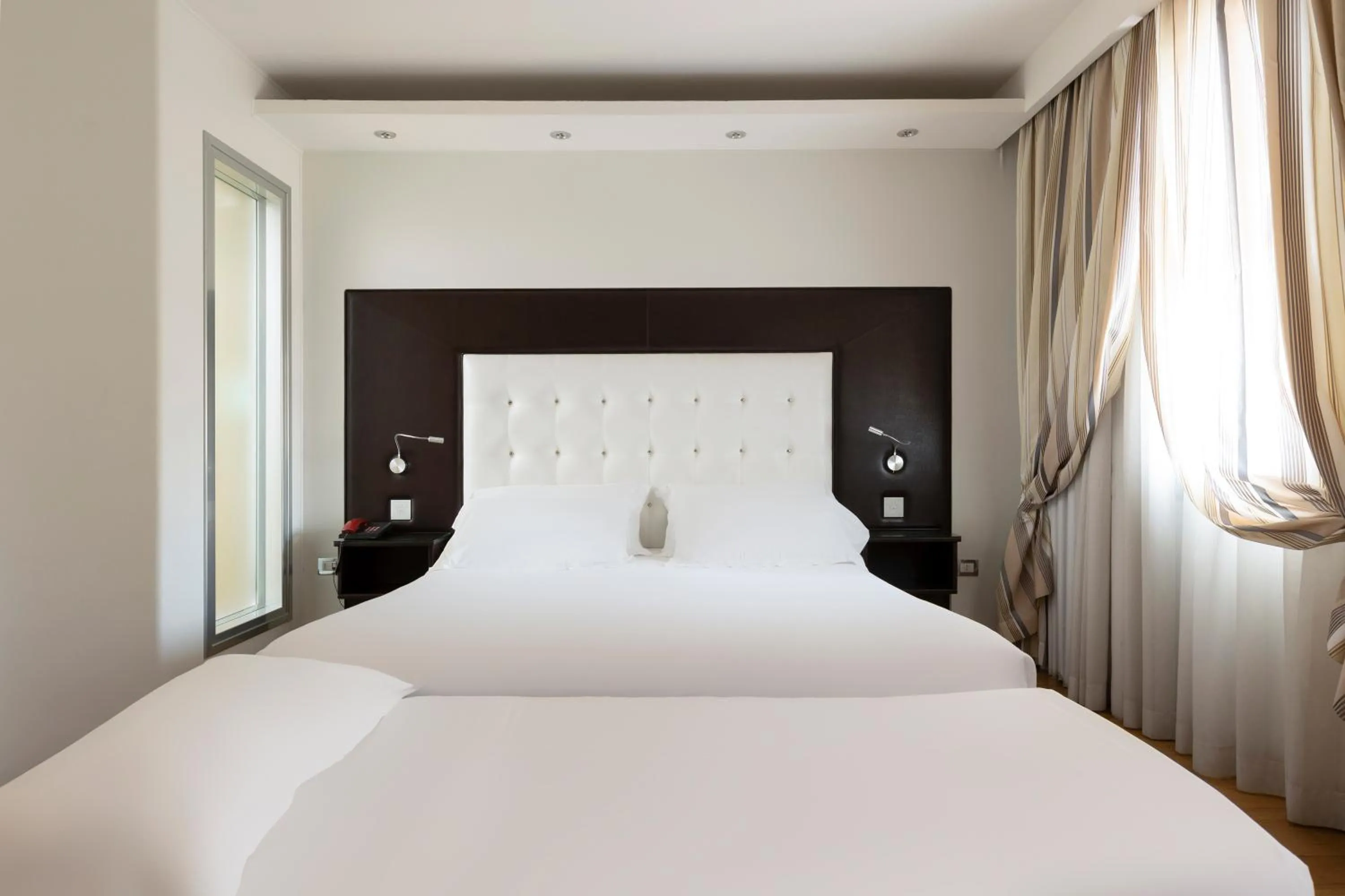 Bed in Hotel Royal Caserta