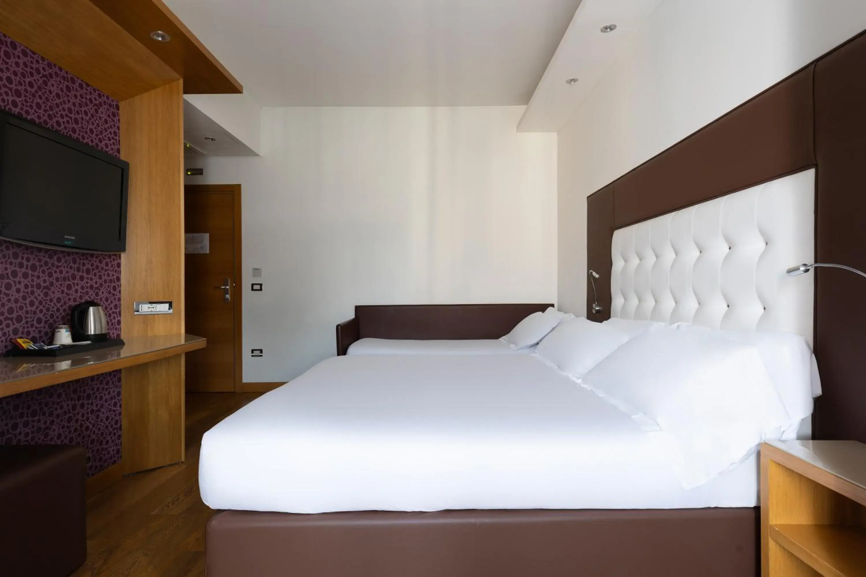 Triple Room in Hotel Royal Caserta Triple Room in Hotel Royal Caserta