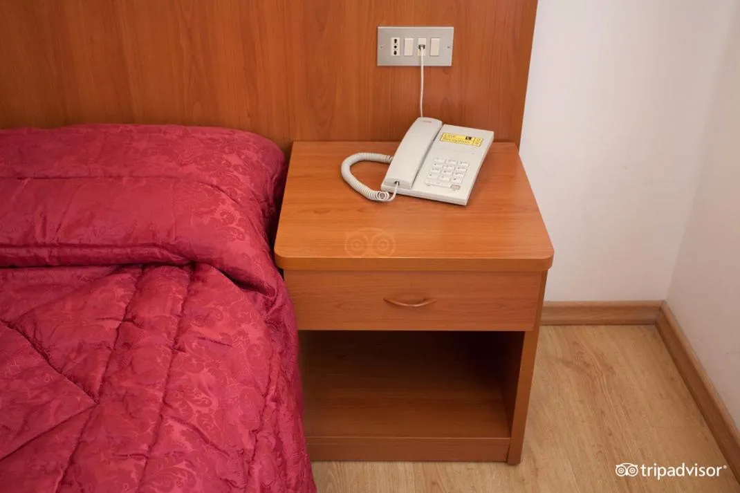 Bed in Hotel Caprera