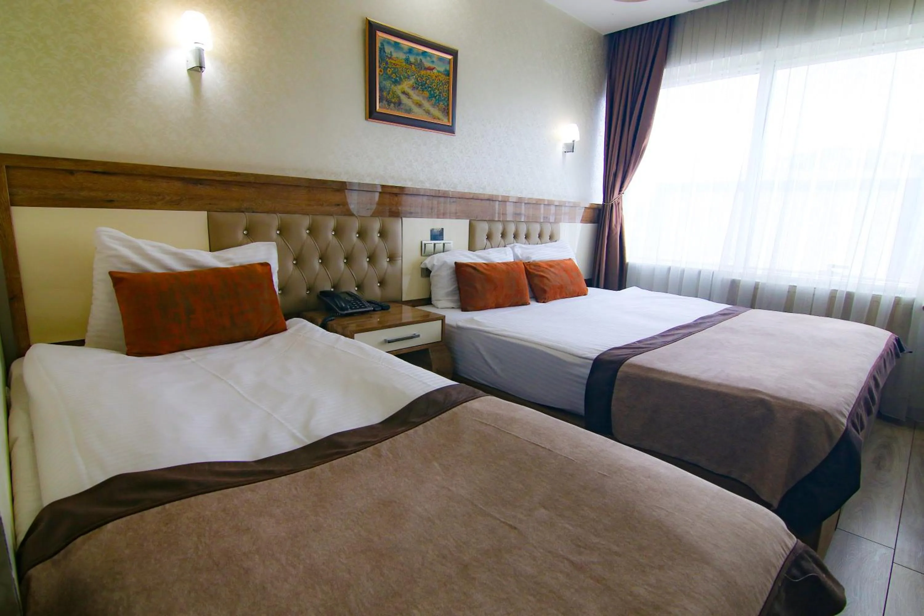 Bed in Grand Zara Hotel