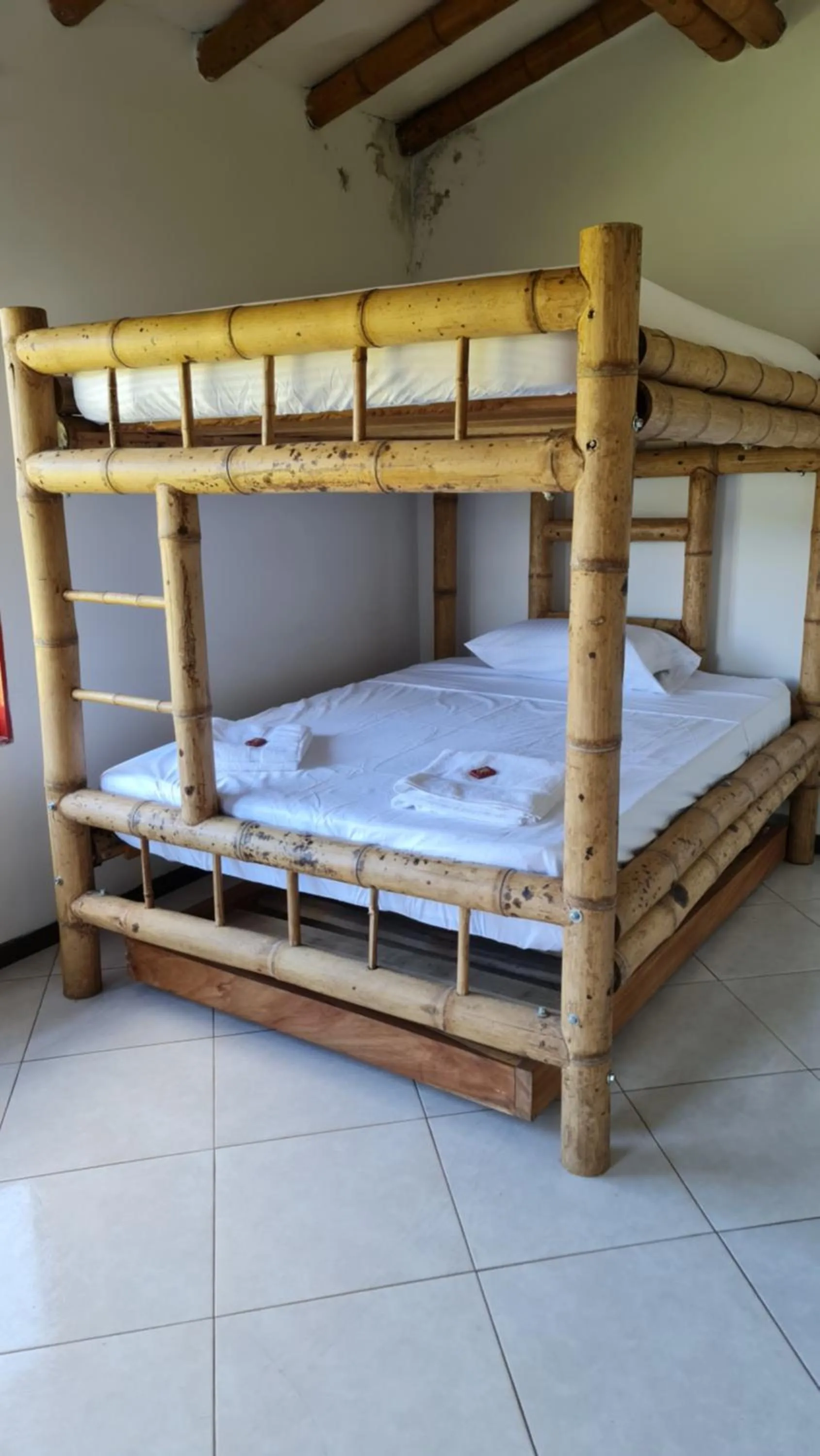 Bed in HOSTERÍA BRISAS DEL RÍO