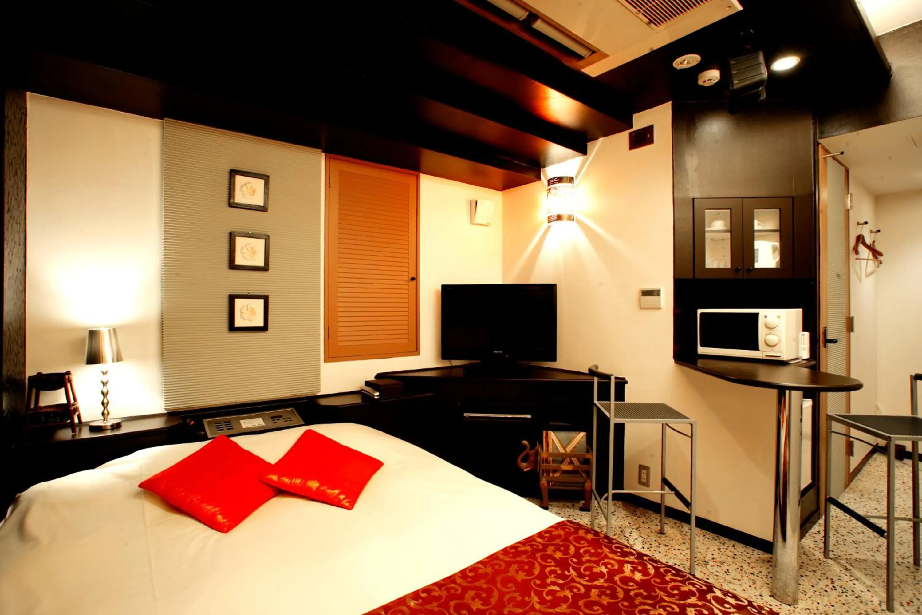 Bed in HOTEL CHECK INN BALI adult only