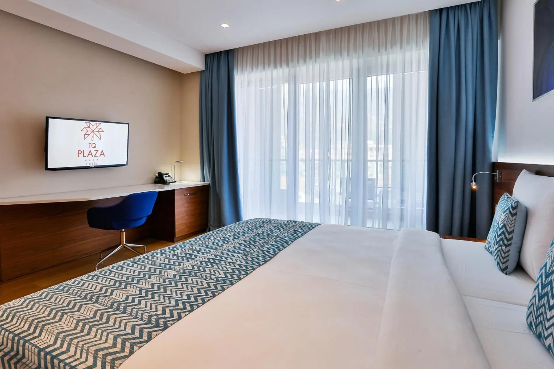 Bed in Hotel TQ Plaza