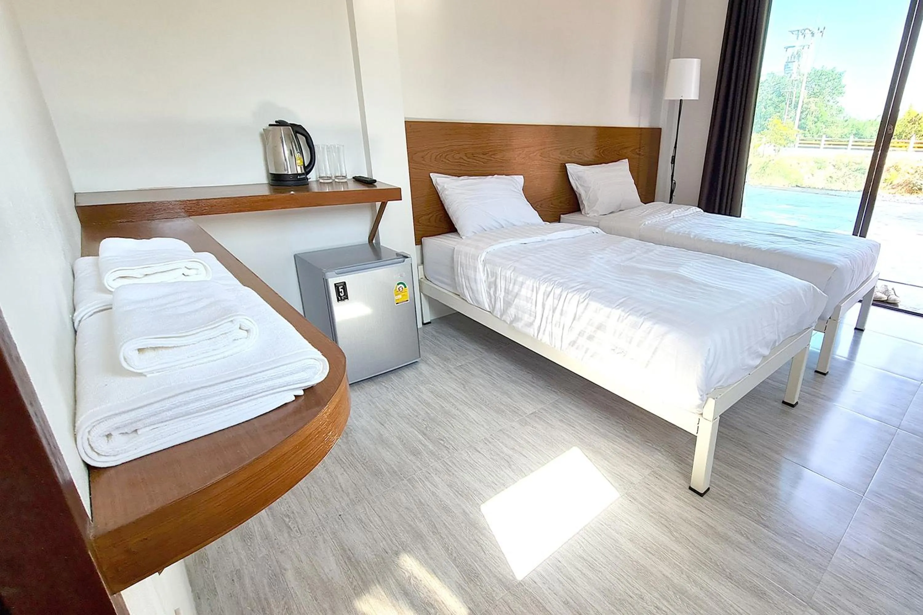 Bed in Phorpun Resort Lampang