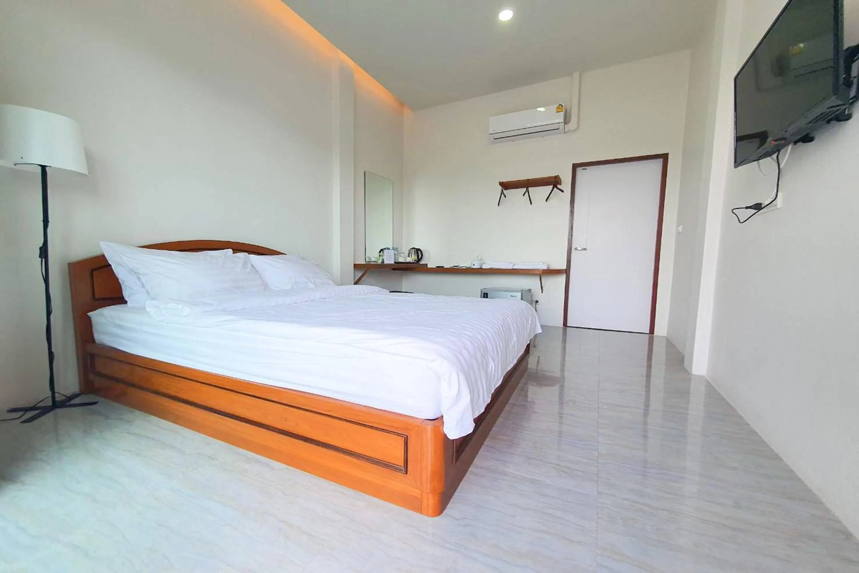 Bed in Phorpun Resort Lampang
