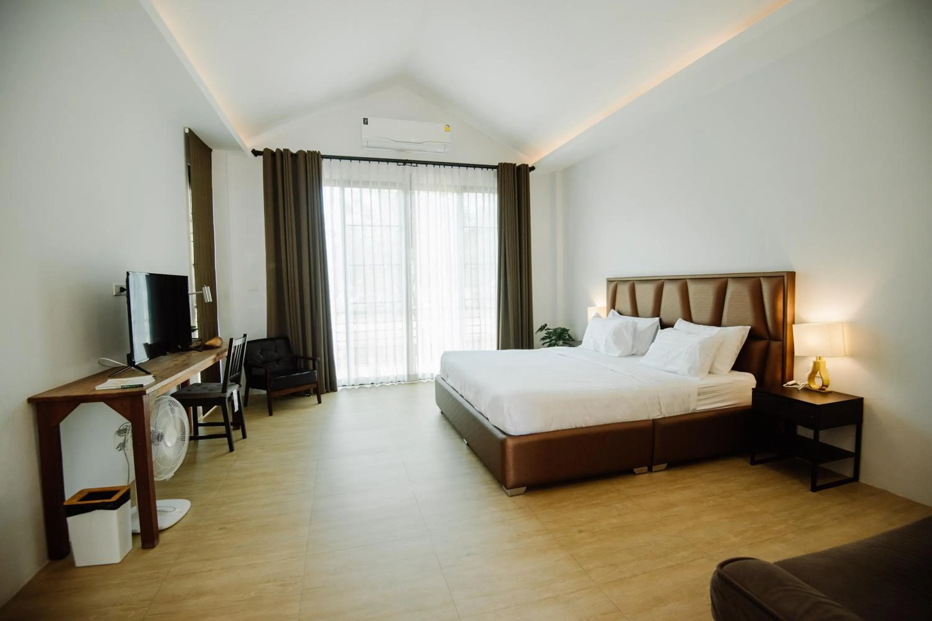 Bed in Phorpun Resort Lampang