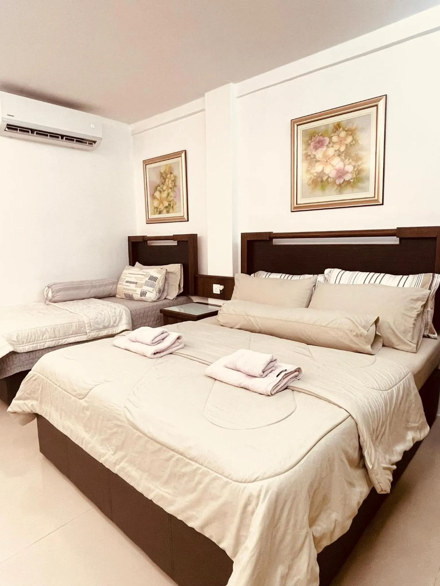 Bed in Wan Studiostay by Khalifa Suites