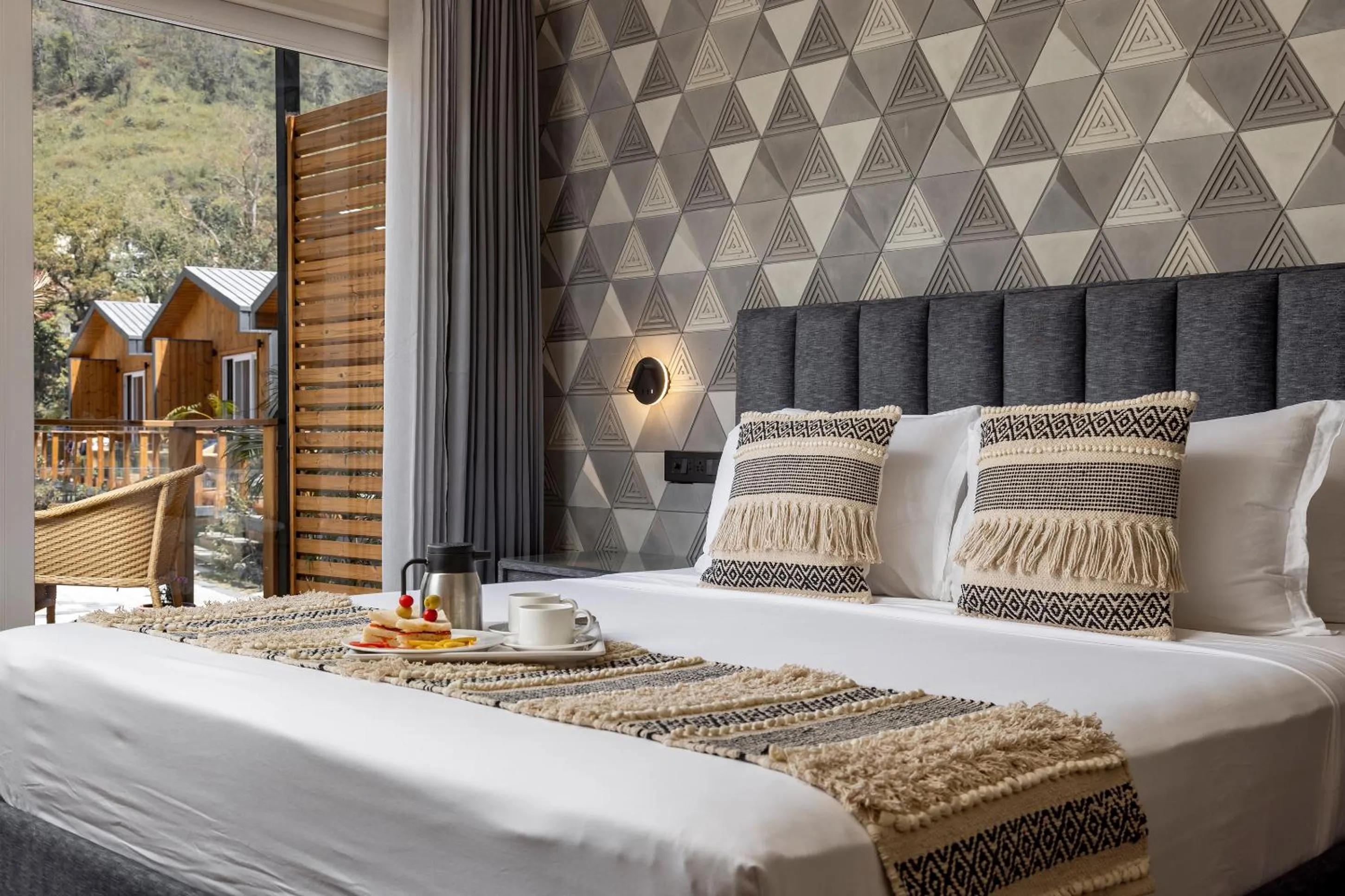 Bed in juSTa Rasa Retreat & Spa Rishikesh