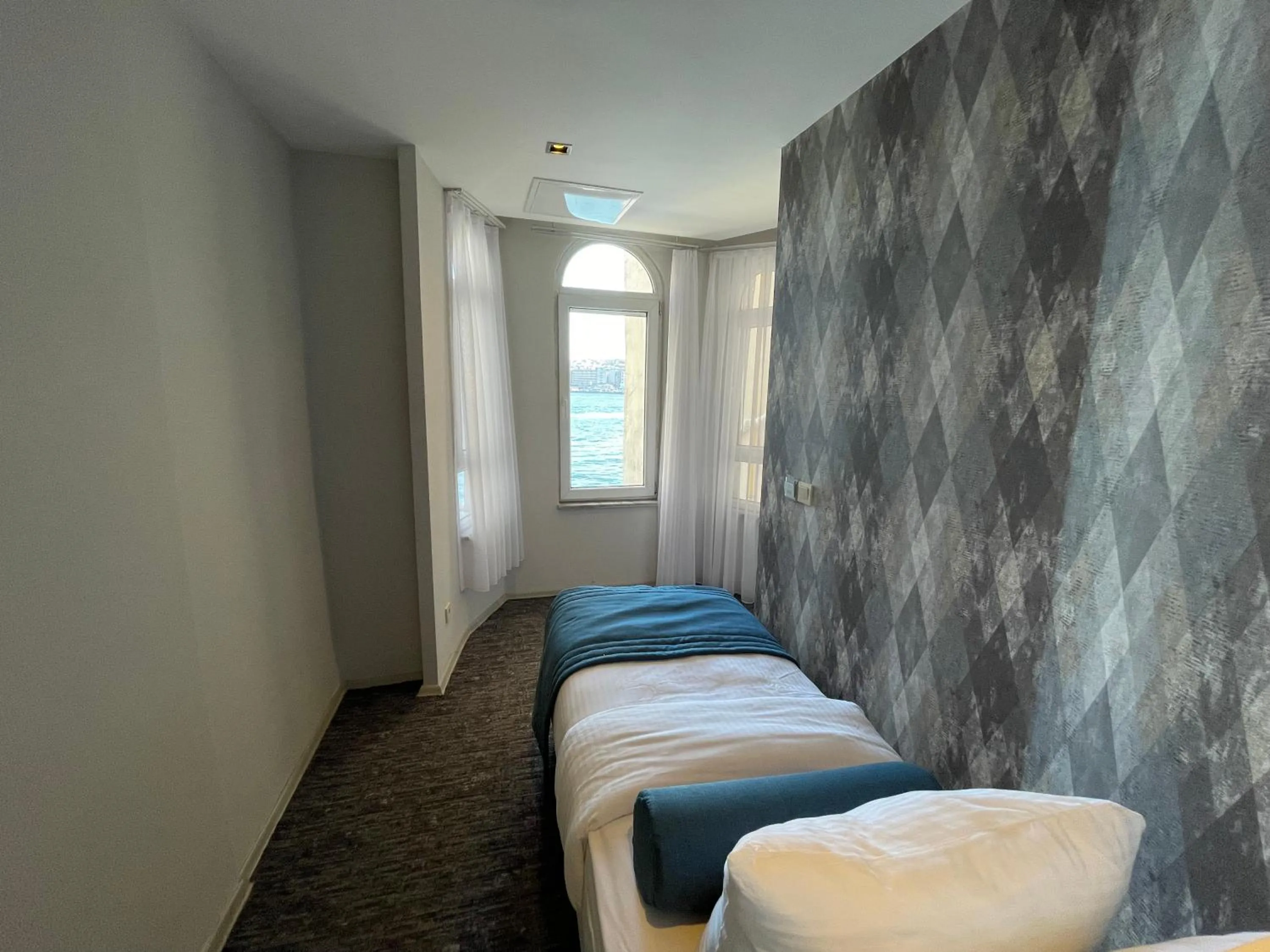 Bed in Weingart Seaside Hotel