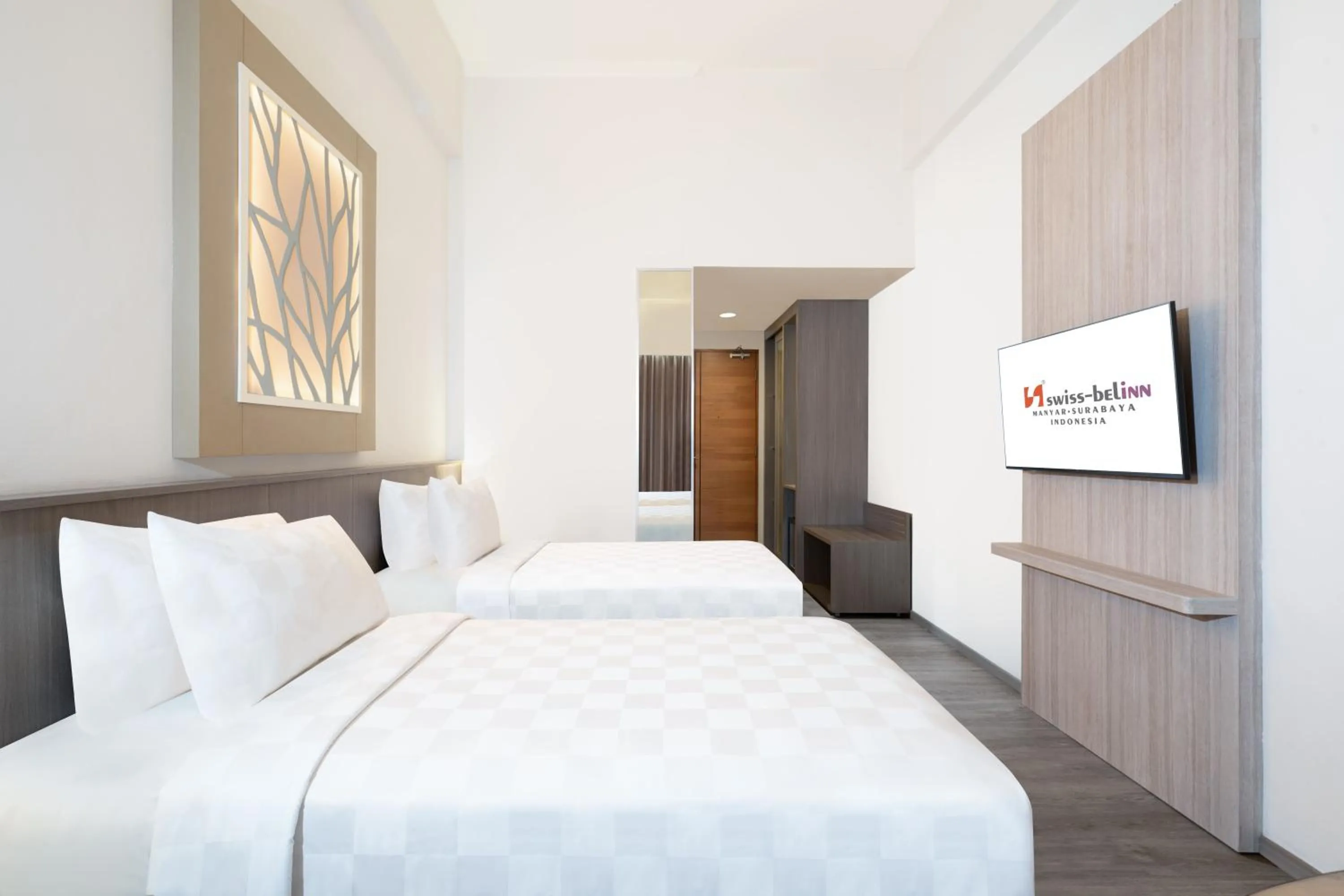 Bed in Swiss-Belinn Manyar