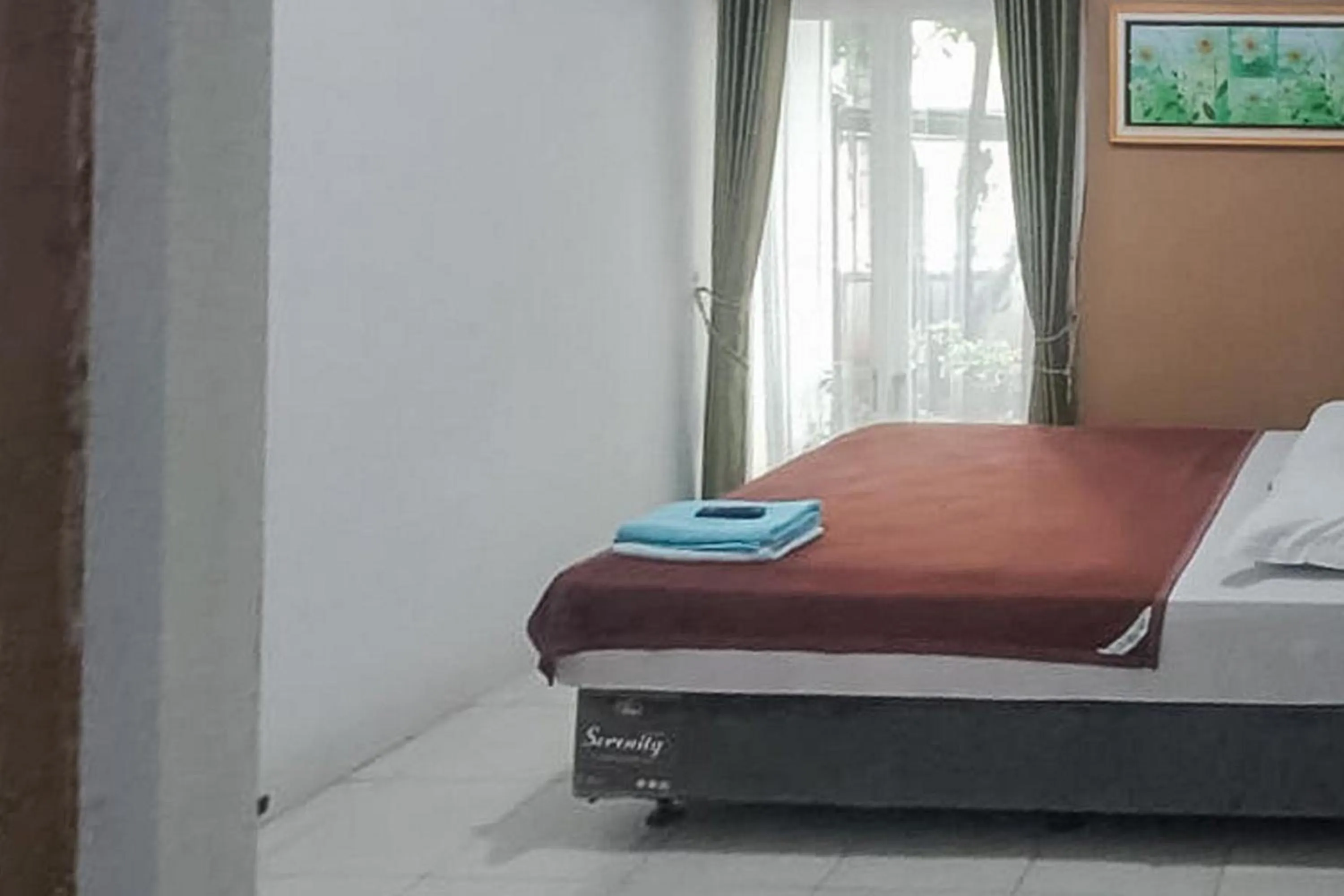 Bed in Syafa Homestay Syariah Mitra RedDoorz