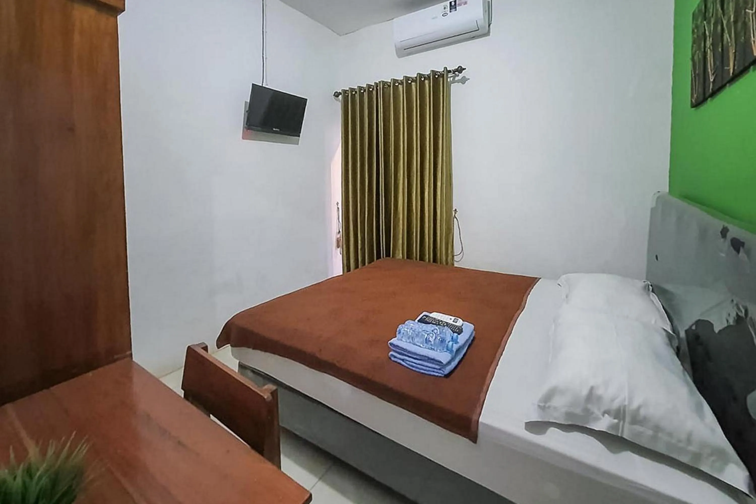 Bed in Syafa Homestay Syariah Mitra RedDoorz