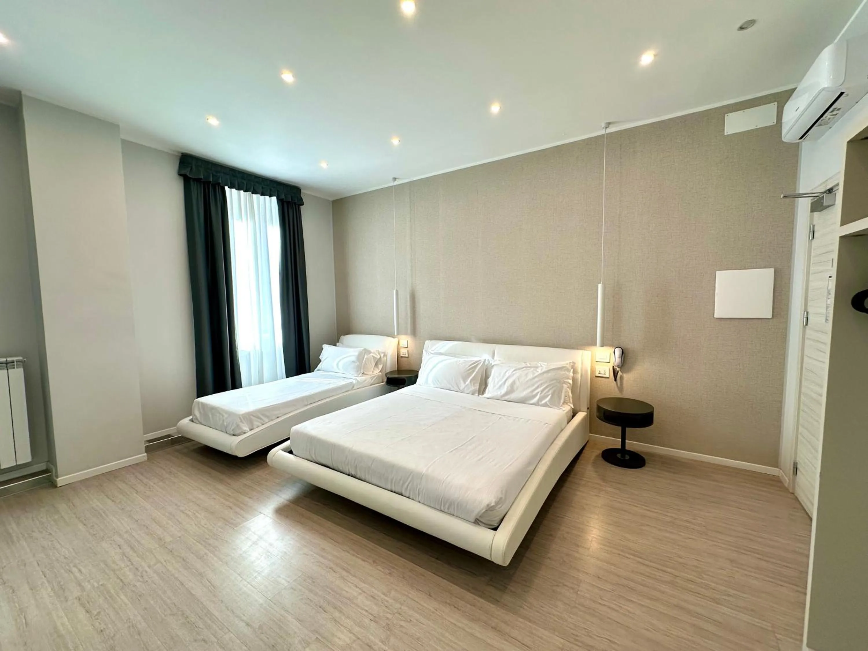 Bed in Cadorna Luxury Hotel