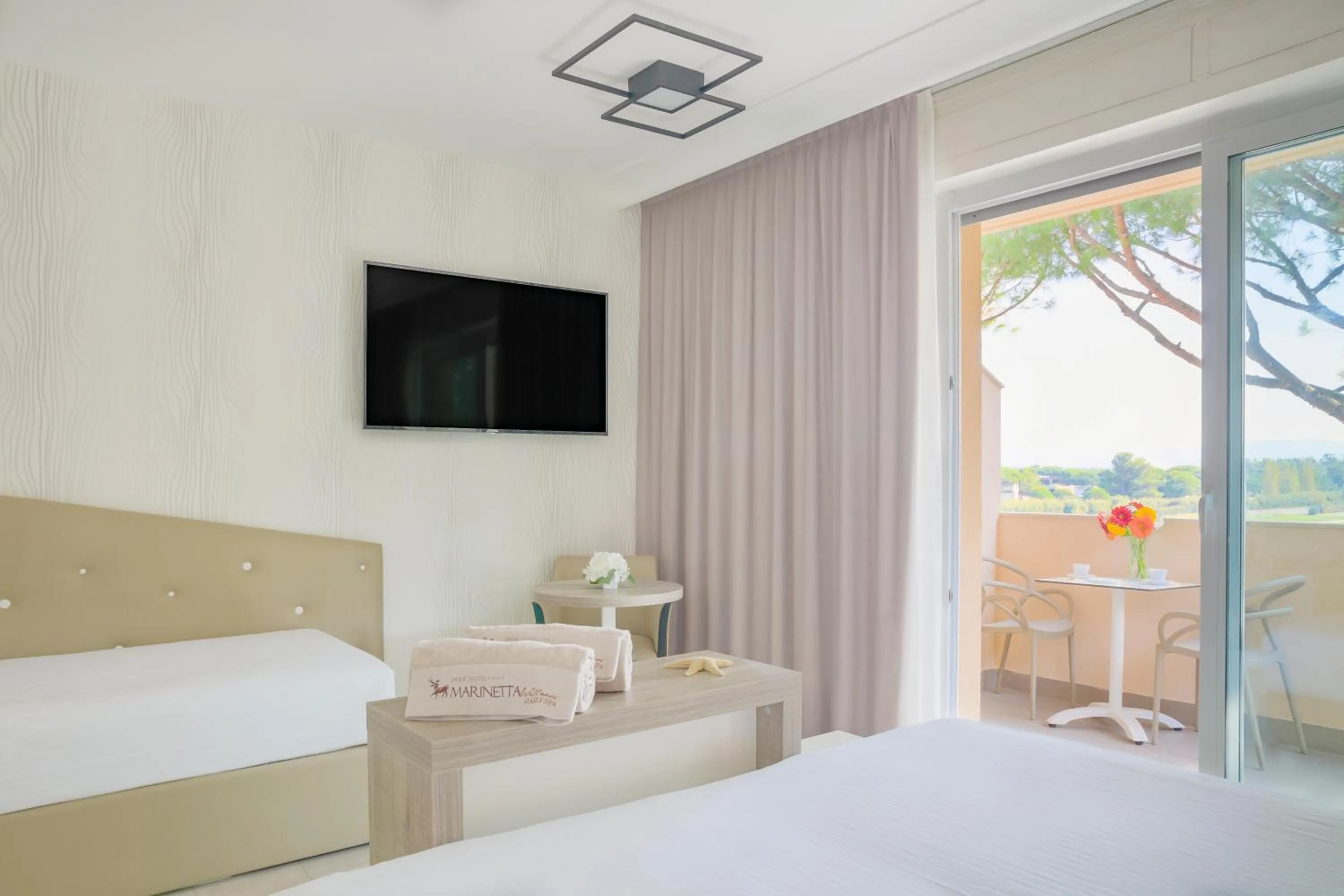 Bedroom, Bed in Park Hotel Marinetta - Beach & Spa