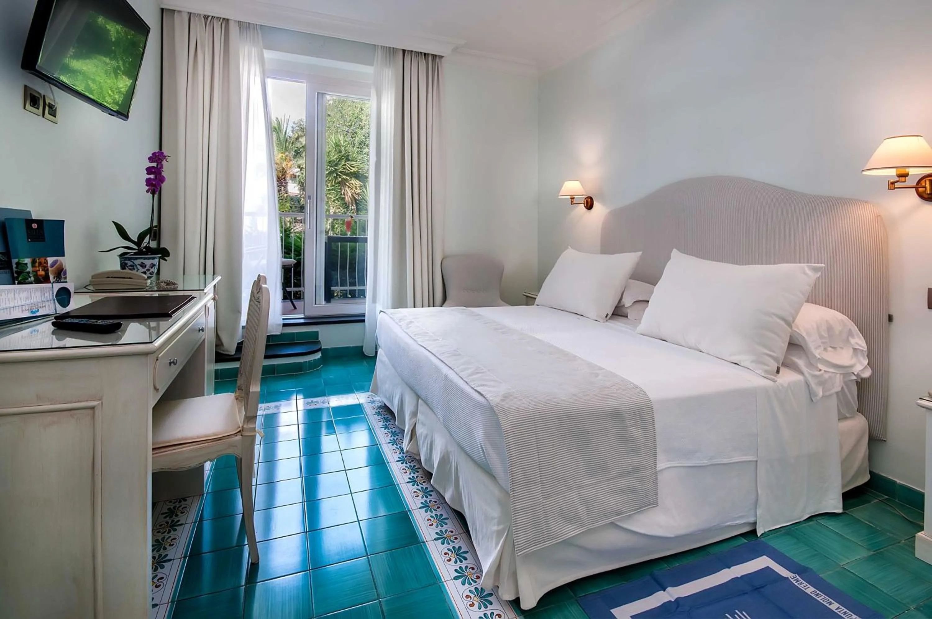 Bed in Punta Molino Beach Resort & Thermal Spa