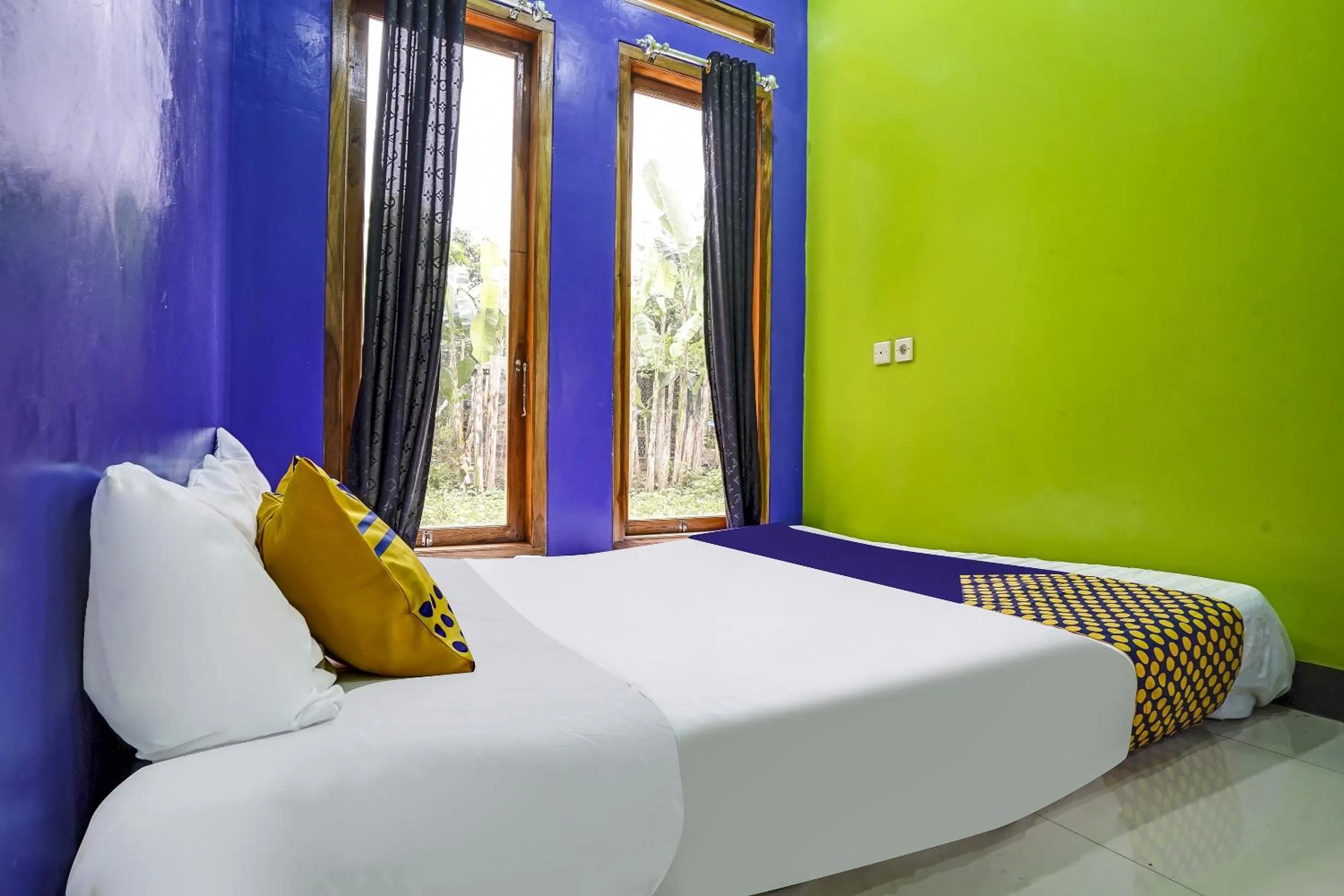 Bedroom in OYO Homes 90916 Eco Tourism Geopark Rajamandala Homestay Syariah