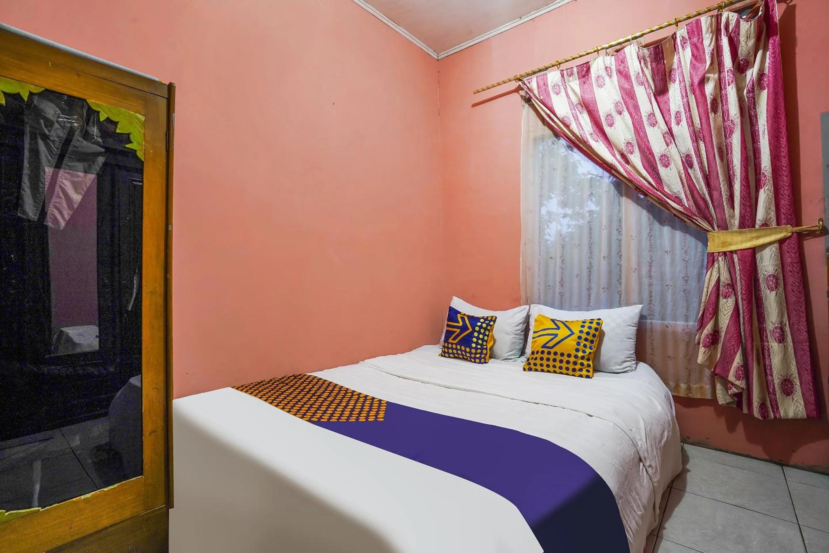 Bedroom in OYO Homes 90916 Eco Tourism Geopark Rajamandala Homestay Syariah