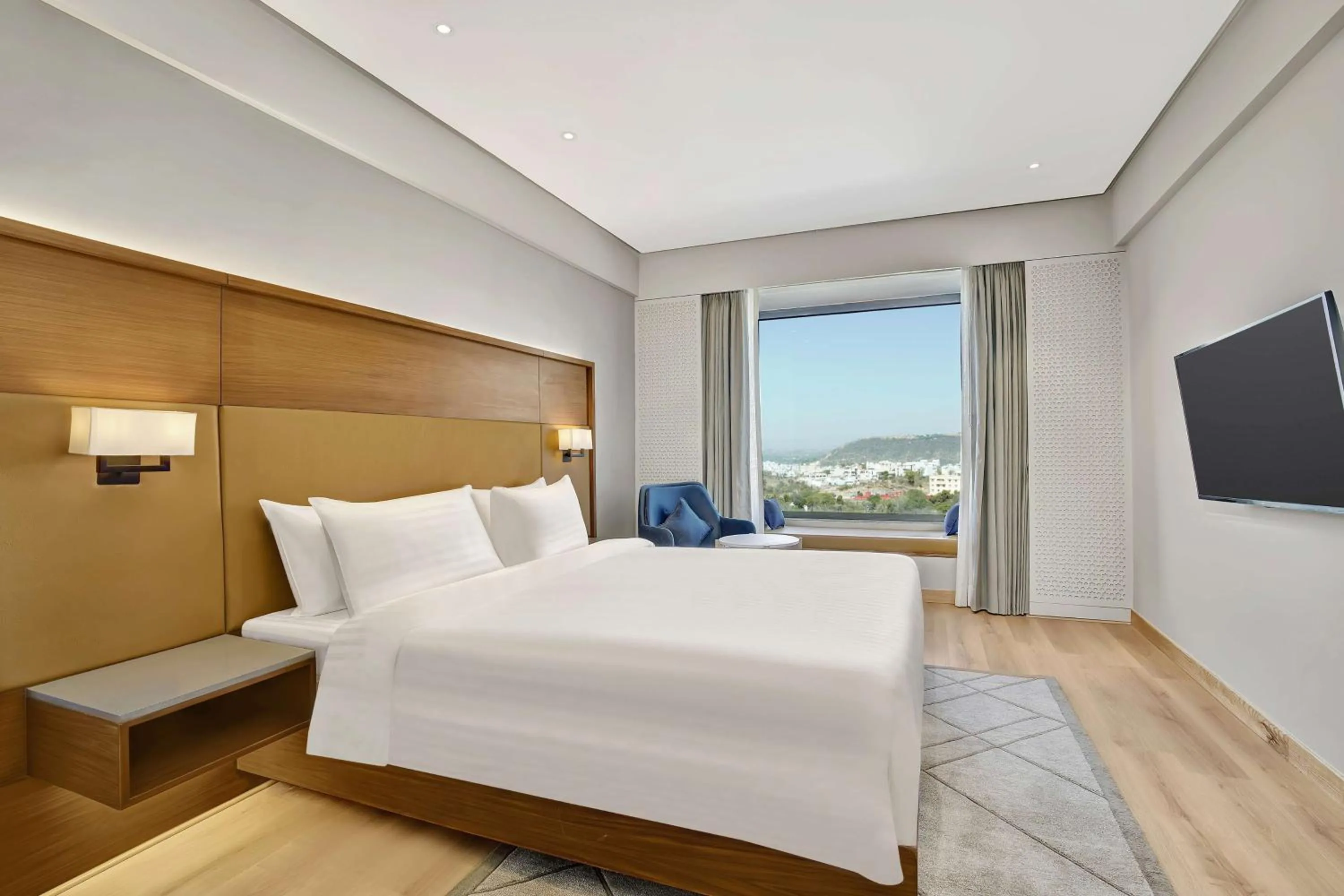 Photo of the whole room, Bed in Radisson Hotel Nathdwara