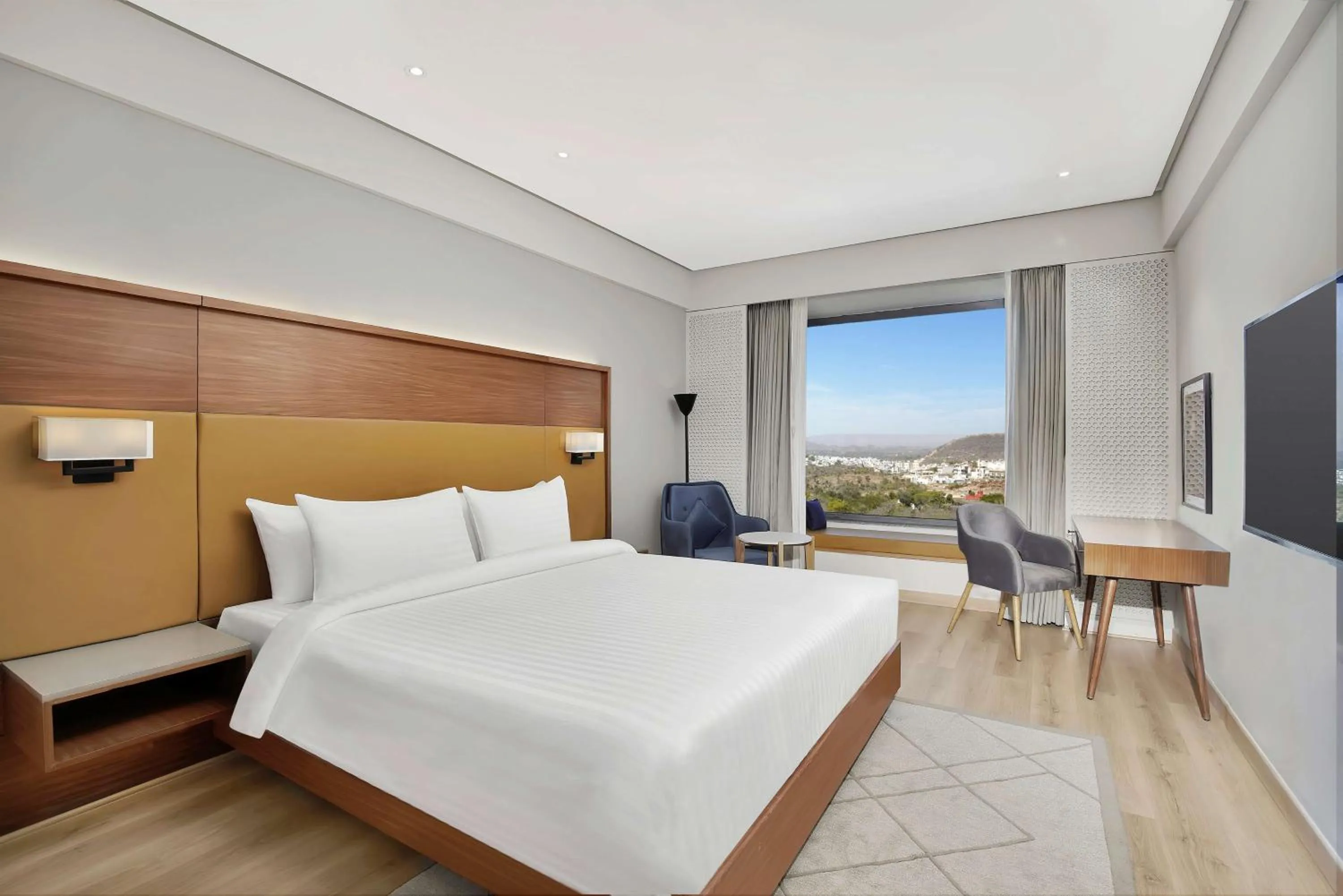 Photo of the whole room, Bed in Radisson Hotel Nathdwara