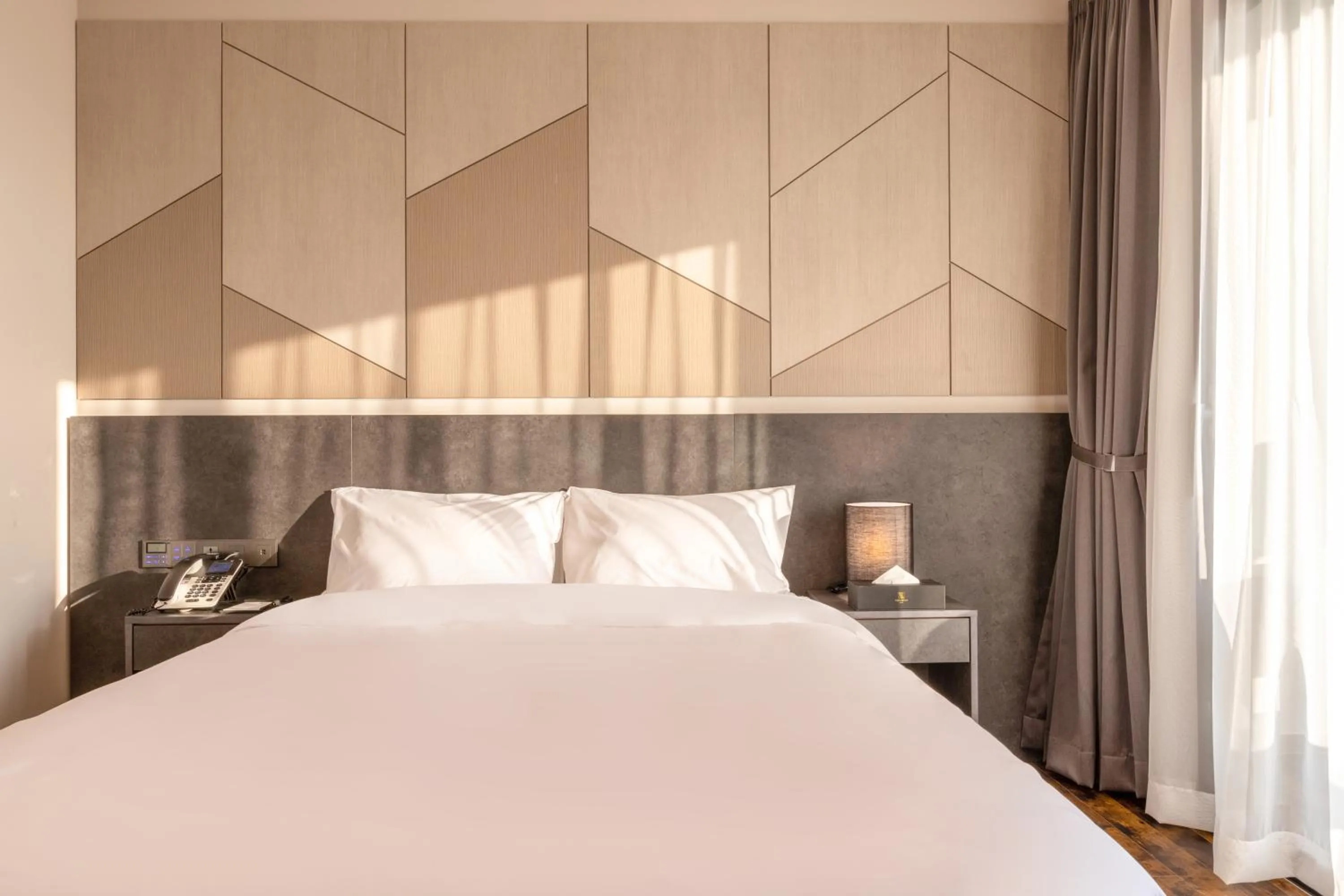 Bed in Urban-Est Hotel