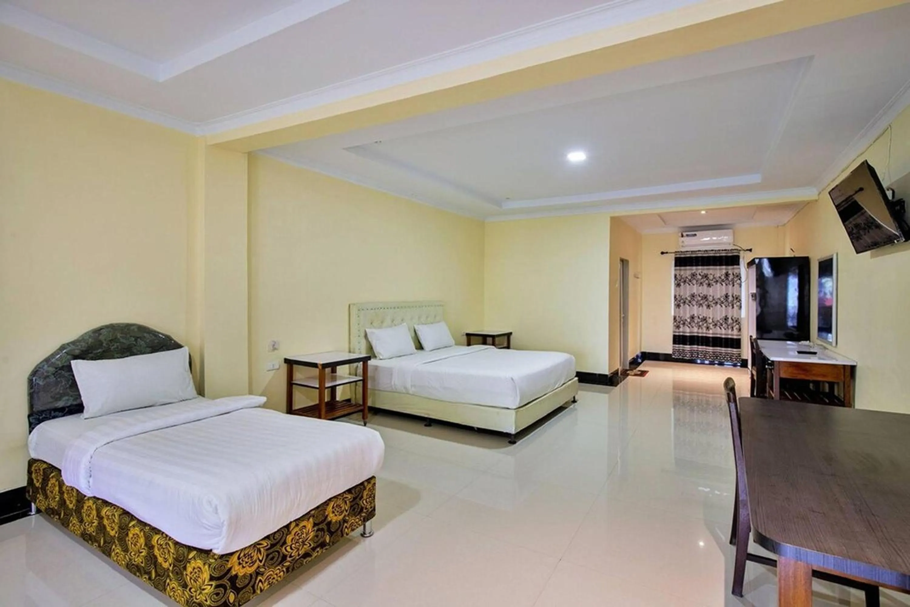 Bed in Malibou Hotel Medan
