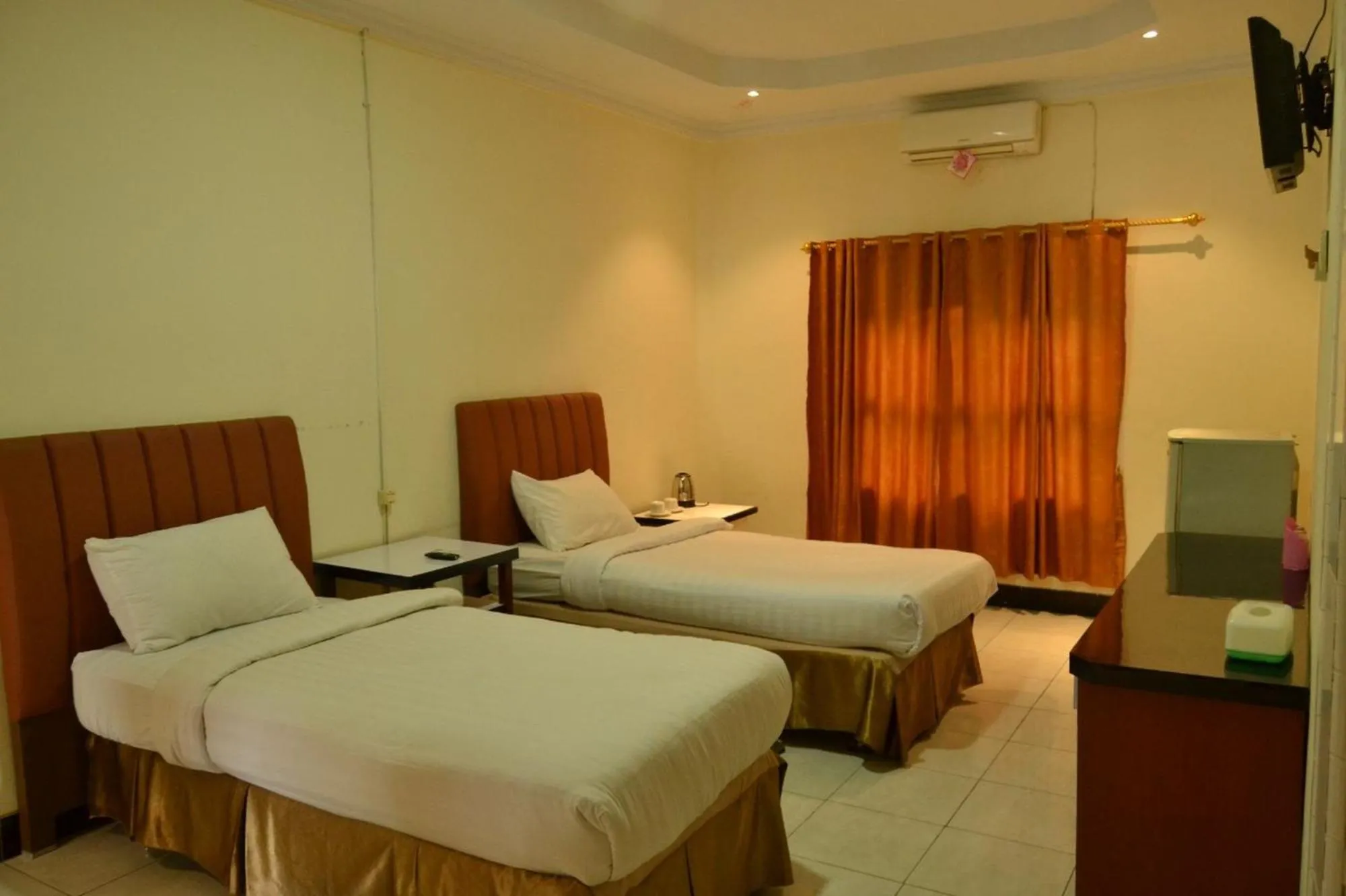 Bed in Malibou Hotel Medan