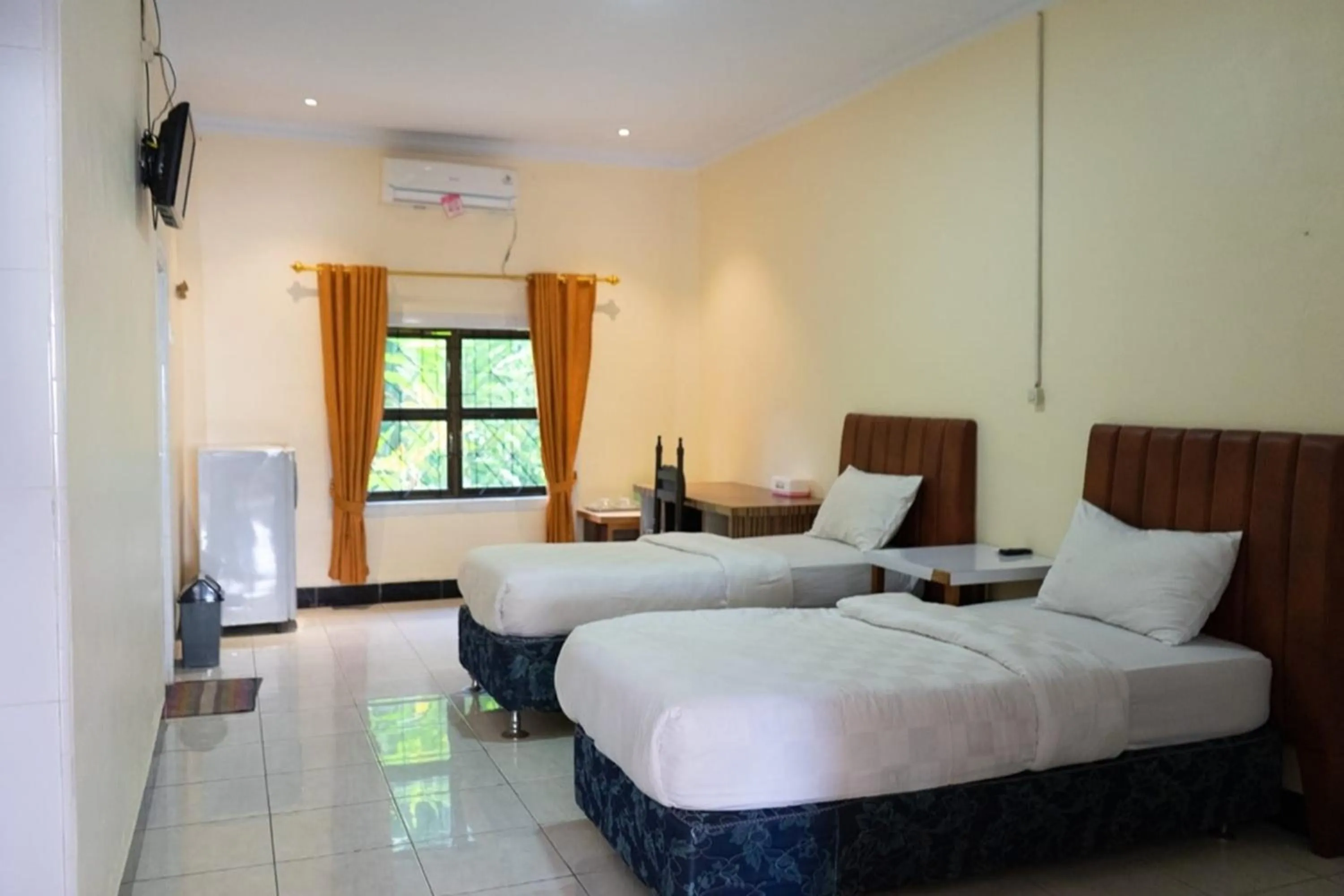 Bed in Malibou Hotel Medan