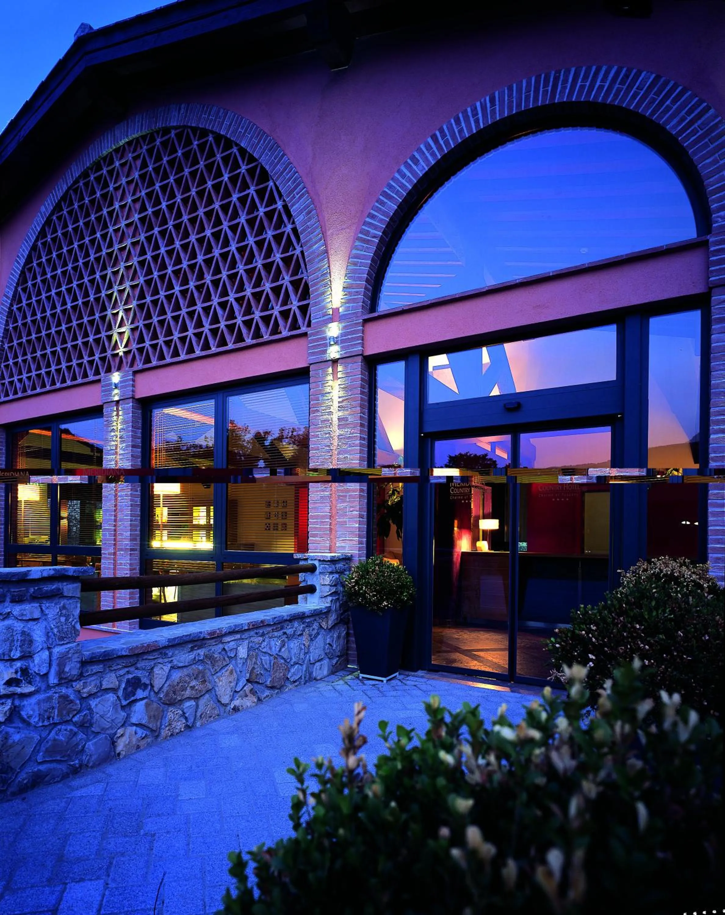 Facade/entrance in Meridiana Country Hotel