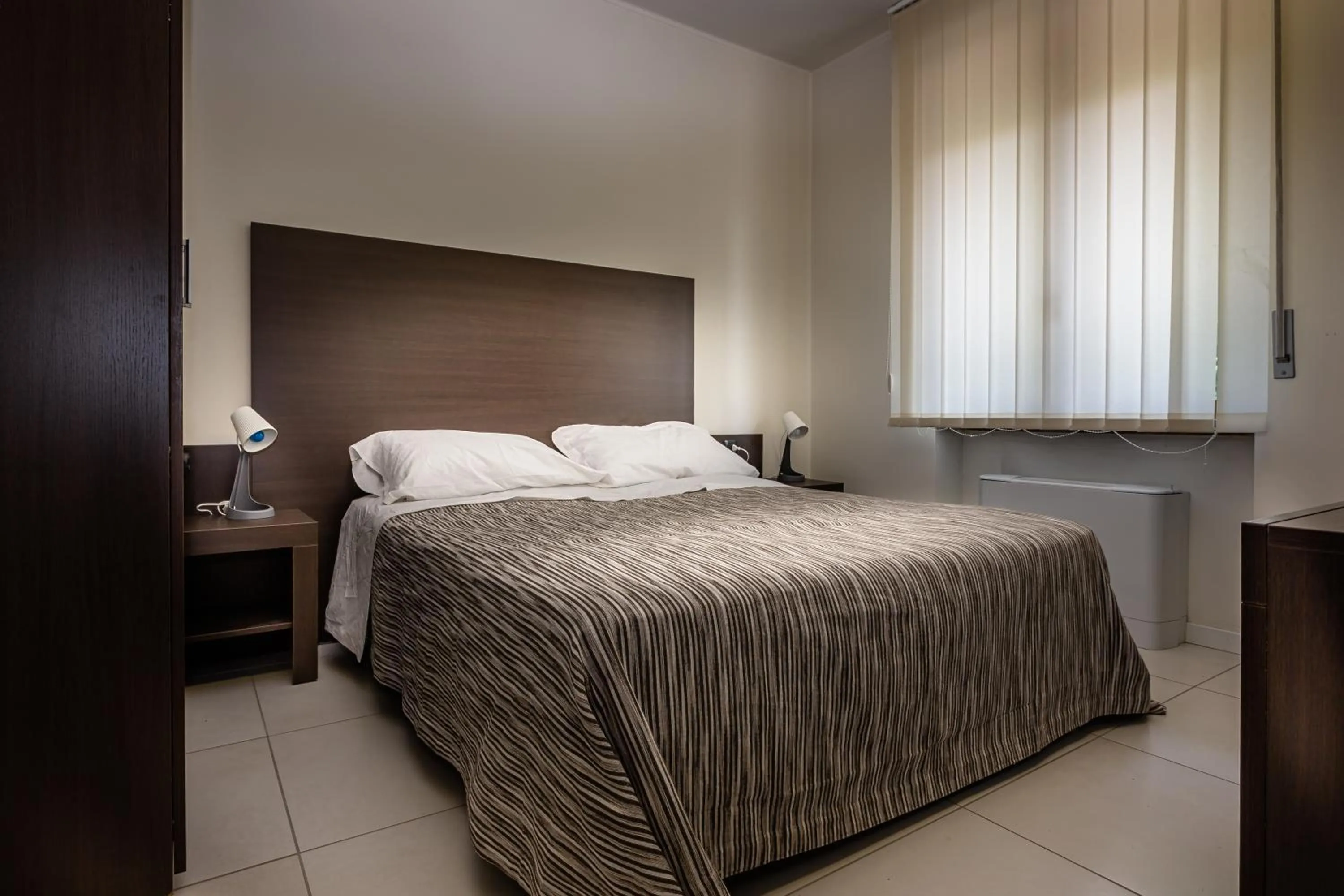 Bed in Pasta Residence Italia Malpensa