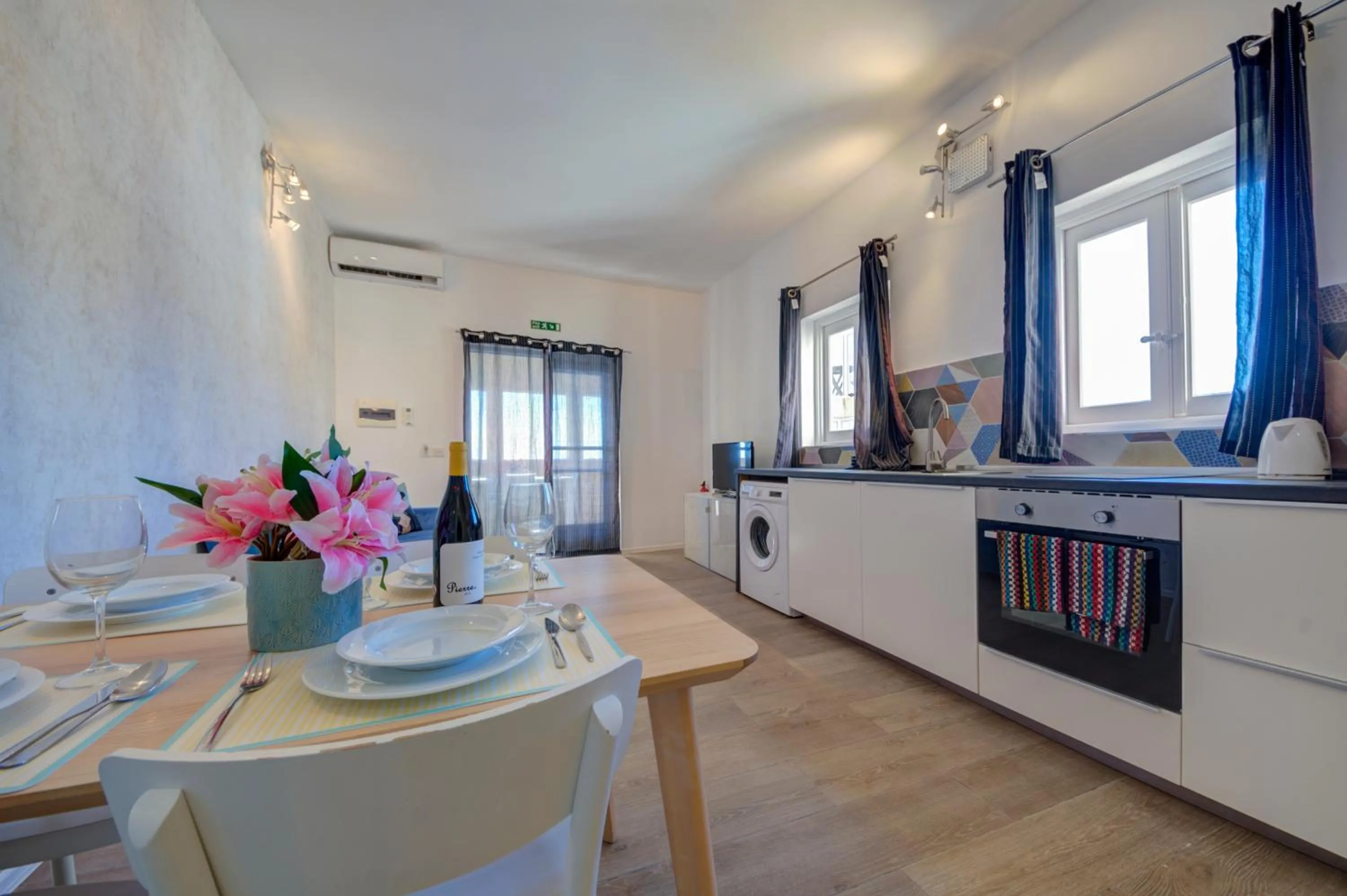 Kitchen or kitchenette in Tritoni Harbour suites - Valletta