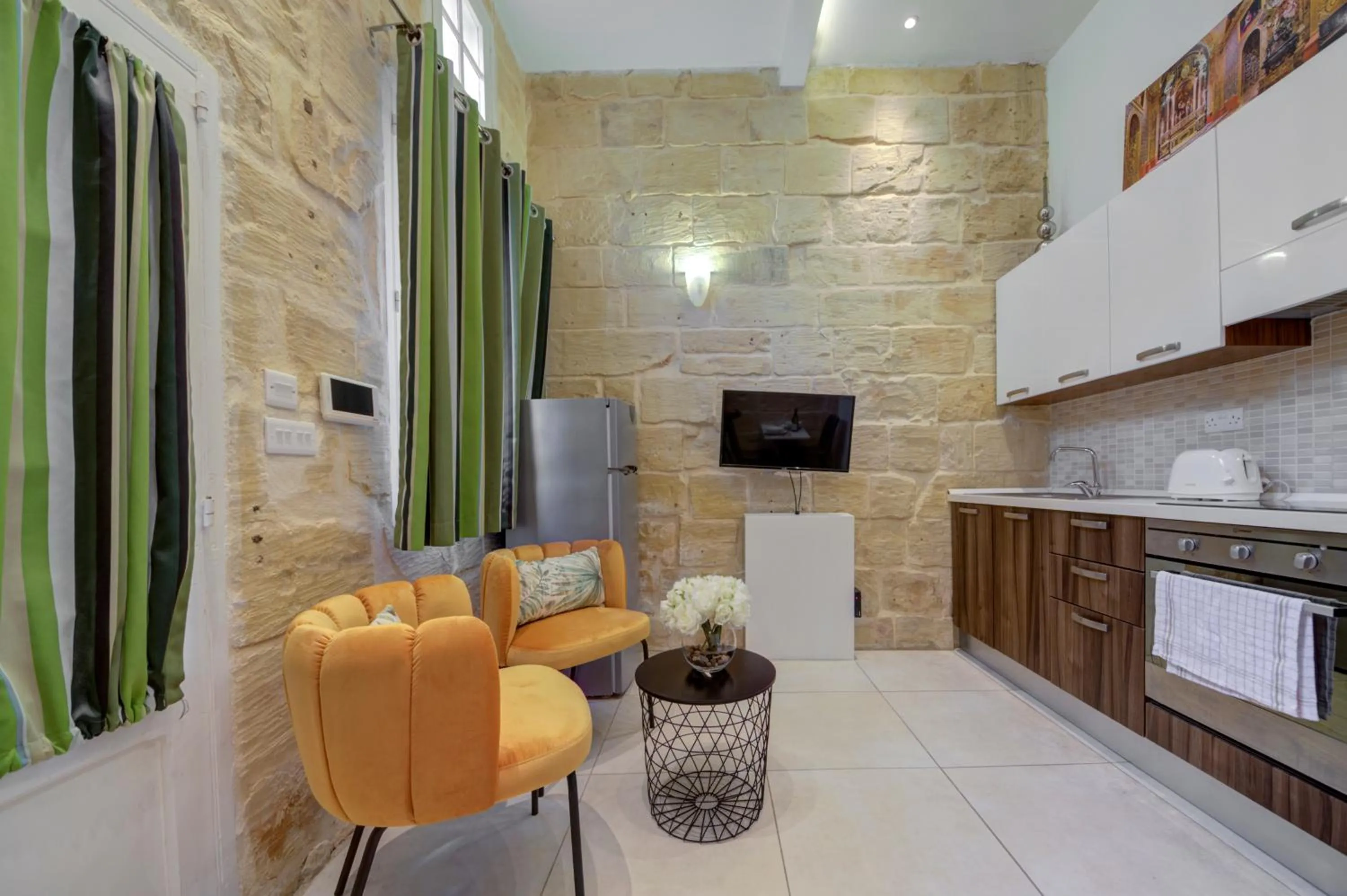 Seating area in Tritoni Harbour suites - Valletta