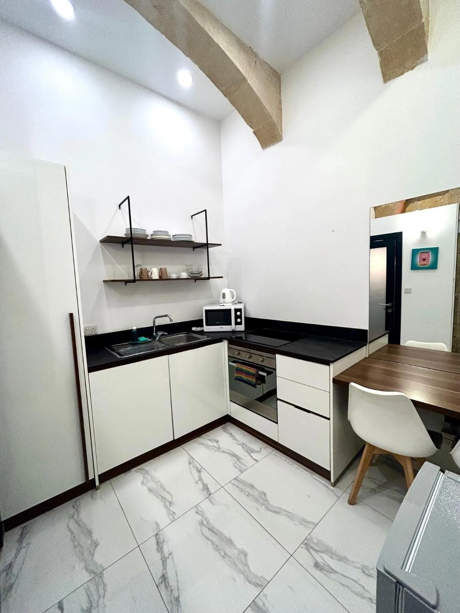 Kitchen or kitchenette in Tritoni Harbour suites - Valletta