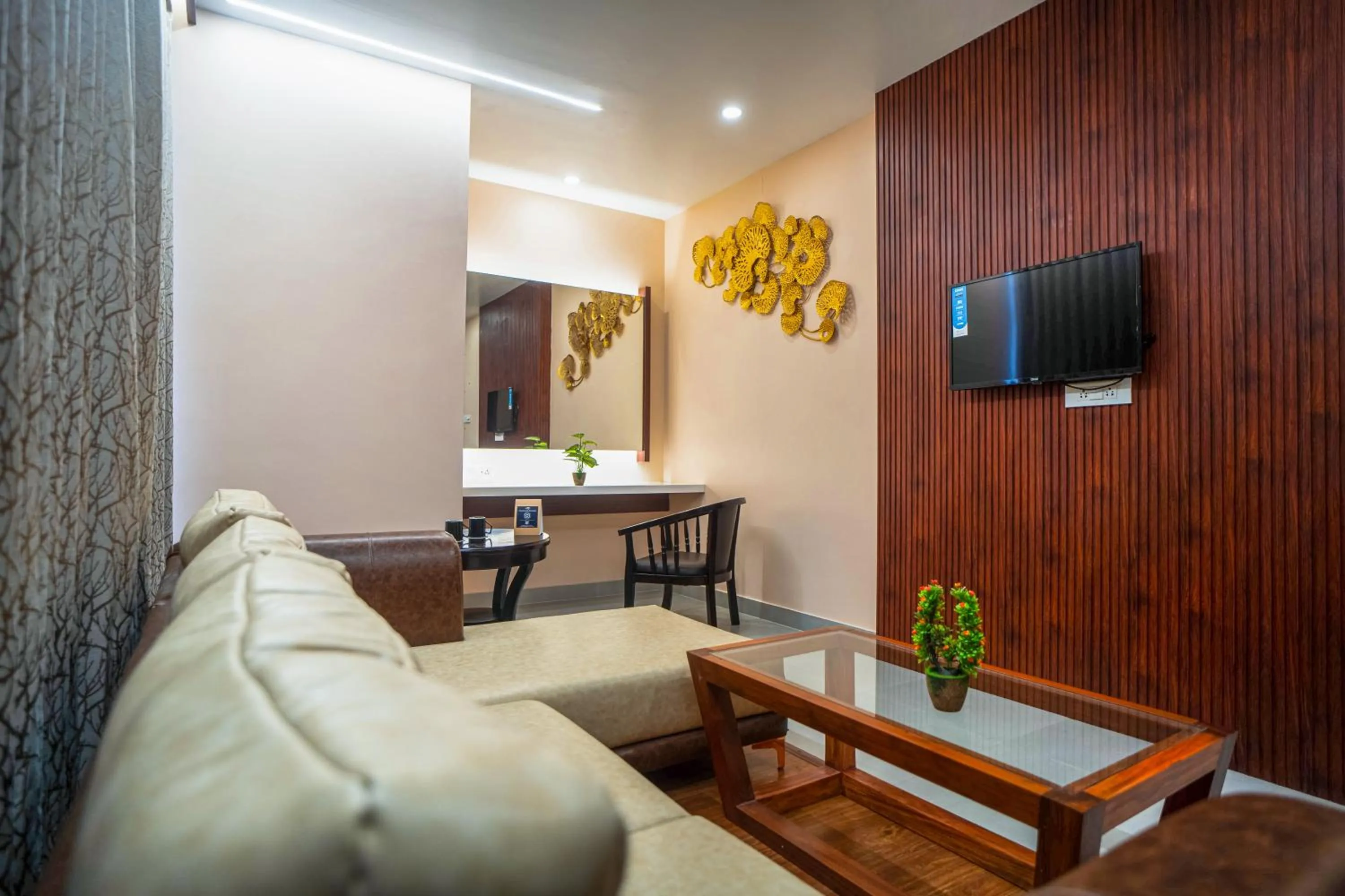 Communal lounge/ TV room in Mansha Palace